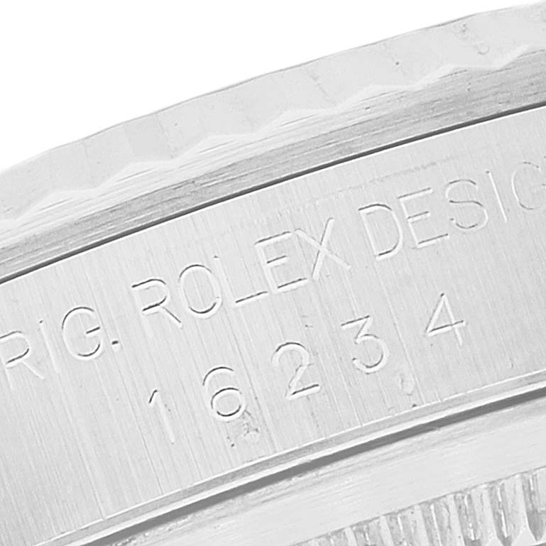 This is a close-up view of the inner bezel with the model number of a Rolex Datejust 16234 Men's Stainless Steel Mother of Pearl Dial 16234 Men's Stainless Steel Mother of Pearl Dial watch.