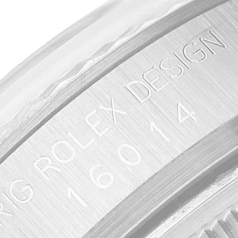 The image shows a detailed close-up of the engraving on the side of a Rolex Datejust 16014 Men's Stainless Steel Silver Dial 16014 Men's Stainless Steel Silver Dial watch, displaying part of the model number.