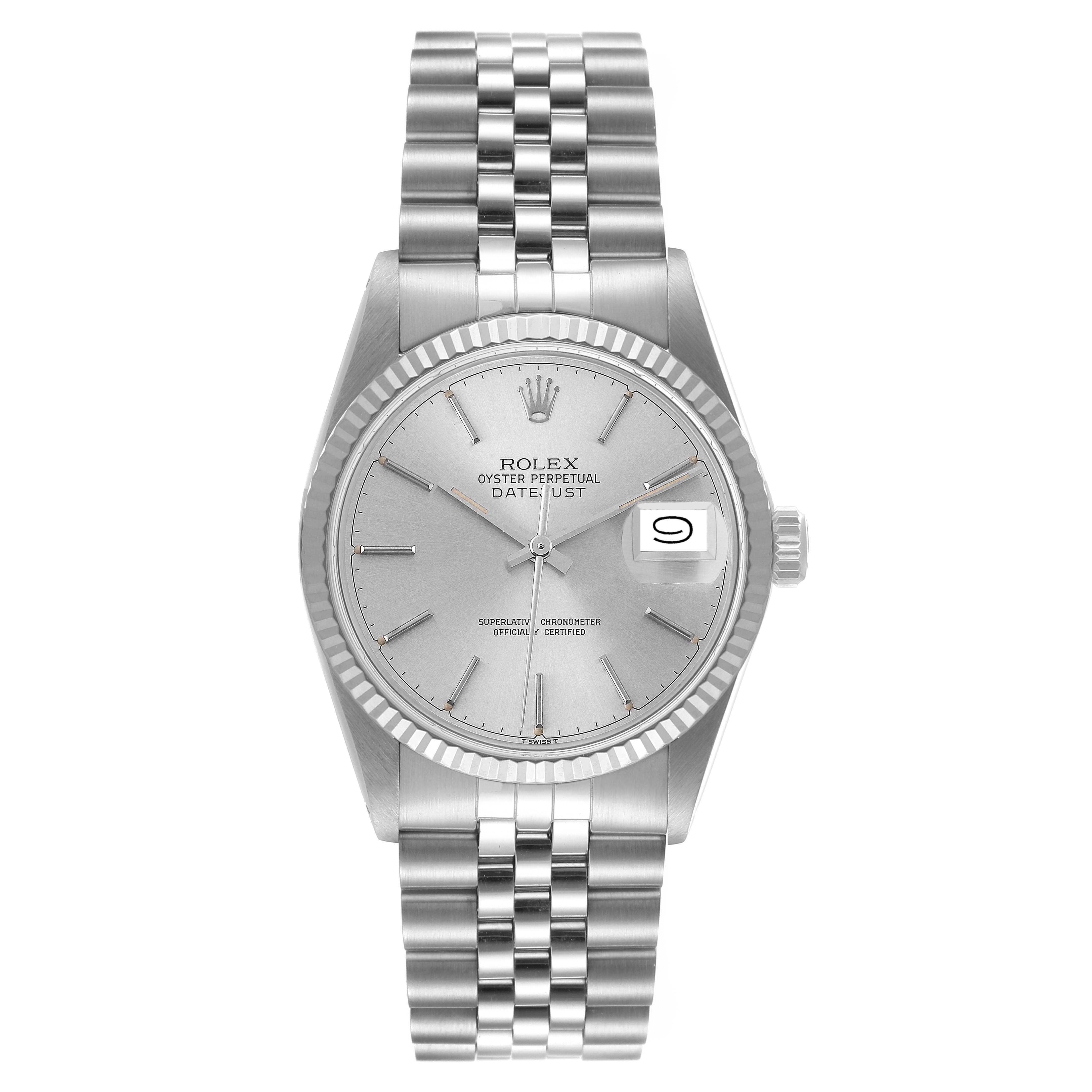 The Rolex Datejust 16014 Men's Stainless Steel Silver Dial 16014 Men's Stainless Steel Silver Dial watch is shown from the front, highlighting the dial, fluted bezel, and Jubilee bracelet.