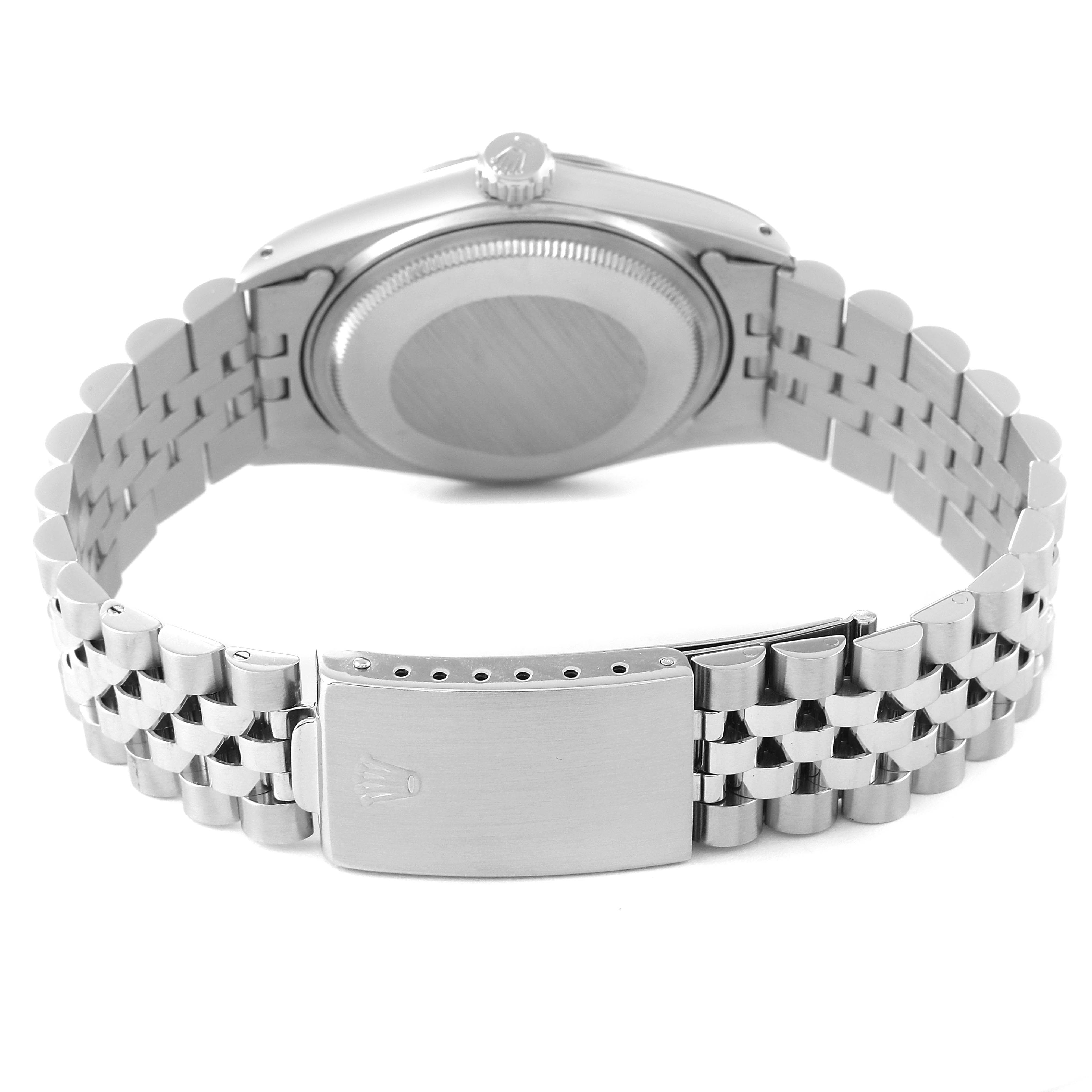 The image shows the back of a Rolex Datejust 16014 Men's Stainless Steel Silver Dial 16014 Men's Stainless Steel Silver Dial watch, featuring its caseback, crown, and Jubilee bracelet with clasp.