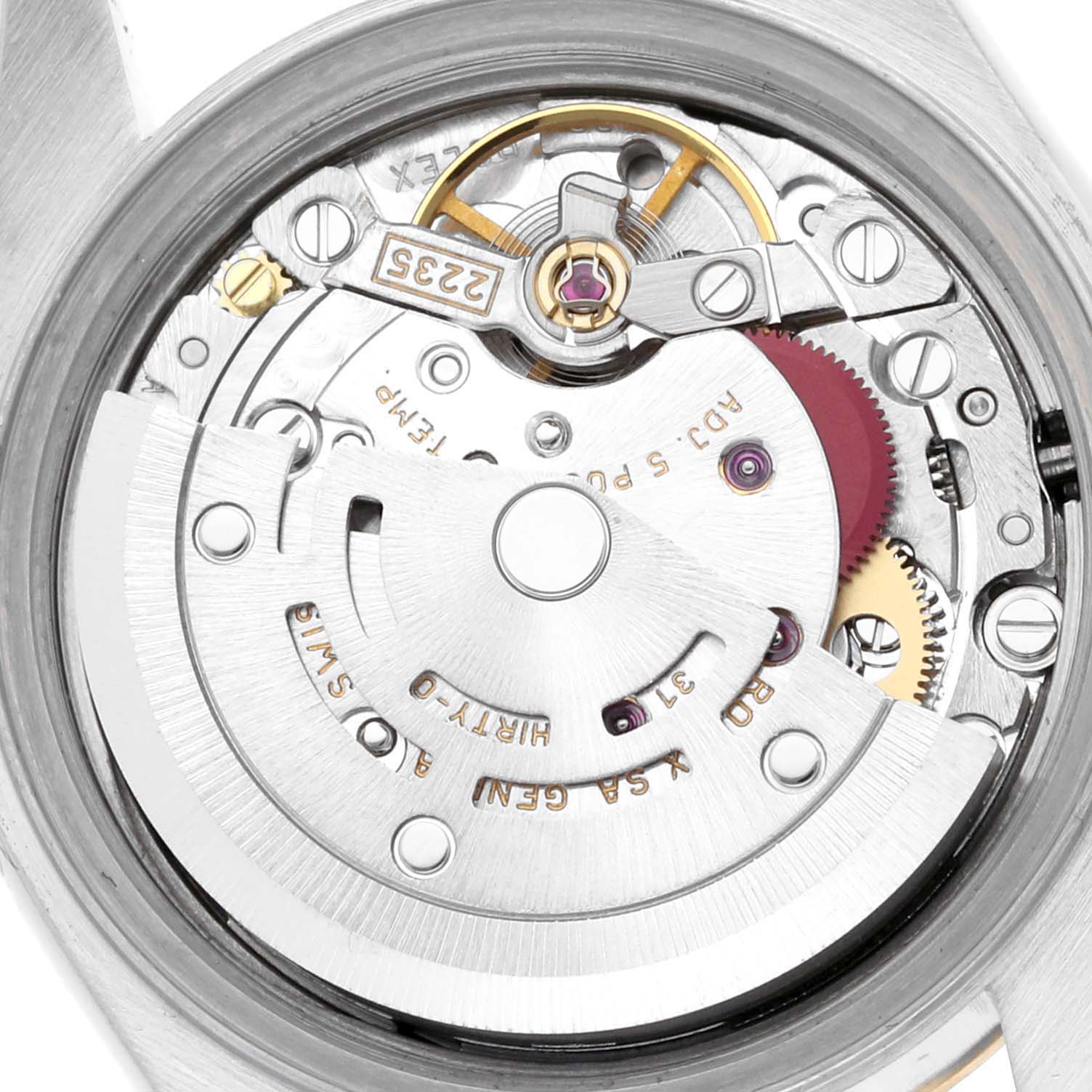 The image shows the intricate movement of a Rolex Datejust 79173 Women's Steel and Gold (two tone) Black Dial 79173 Women's Steel and Gold (two tone) Black Dial watch, highlighting gears and the rotor from the back angle.