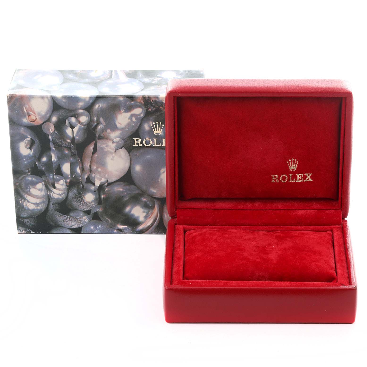 The image shows a red Rolex Datejust 79173 Women's Steel and Gold (two tone) Black Dial 79173 Women's Steel and Gold (two tone) Black Dial watch box and its external packaging, prominently displaying the brand's logo.