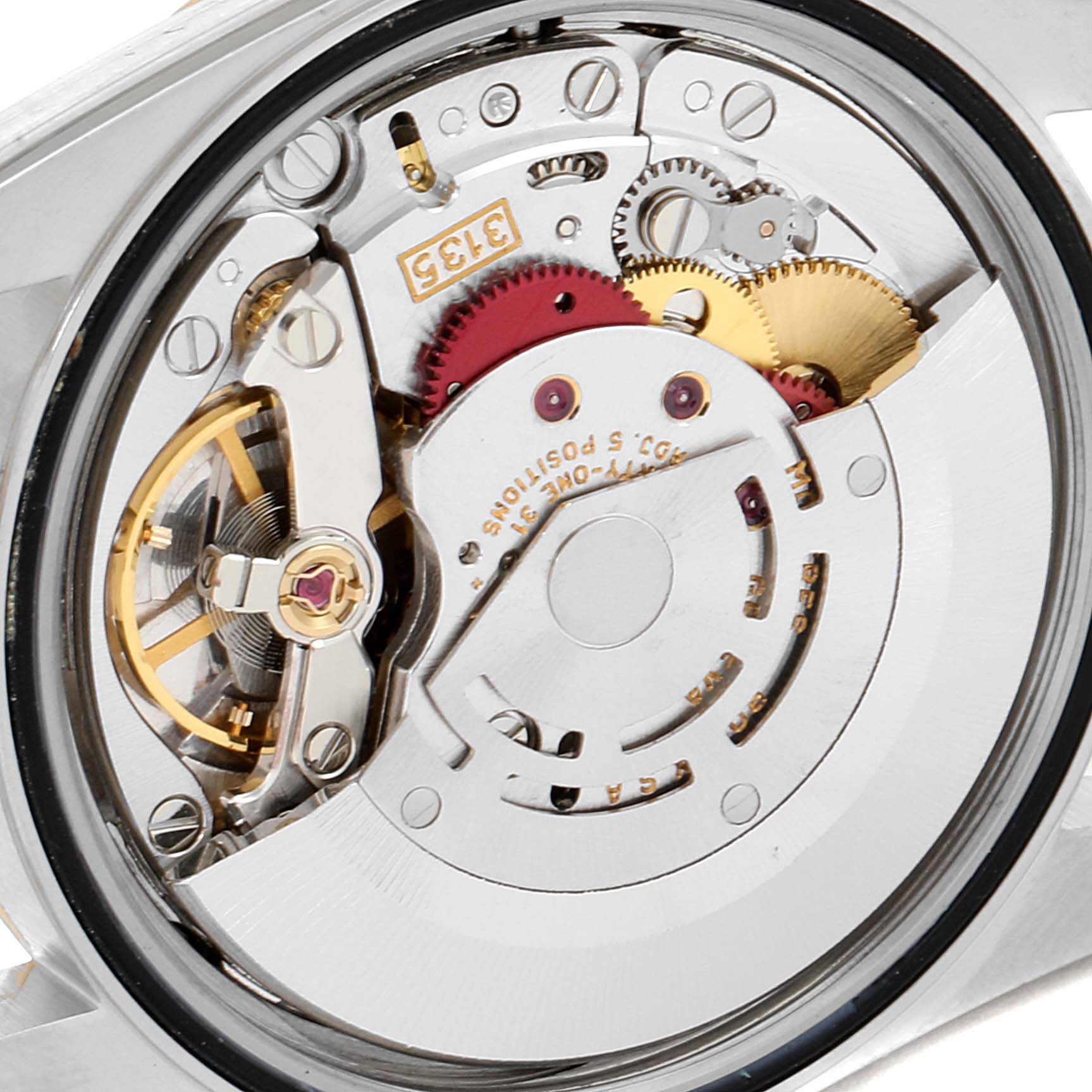 This image shows an angled view of the movement mechanism inside a Rolex Datejust 16233 Men's Steel and Gold (two tone) Black Dial 16233 Men's Steel and Gold (two tone) Black Dial watch, highlighting gears and intricate components.