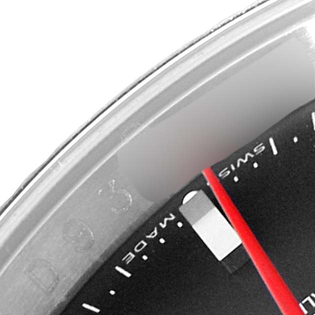 This image shows a close-up of the bezel and part of the dial of a Rolex Turn-o-Graph 116264 Men
s Stainless Steel Black Dial 116264 Men
s Stainless Steel Black Dial watch, highlighting the "Swiss Made" text and a red hand.