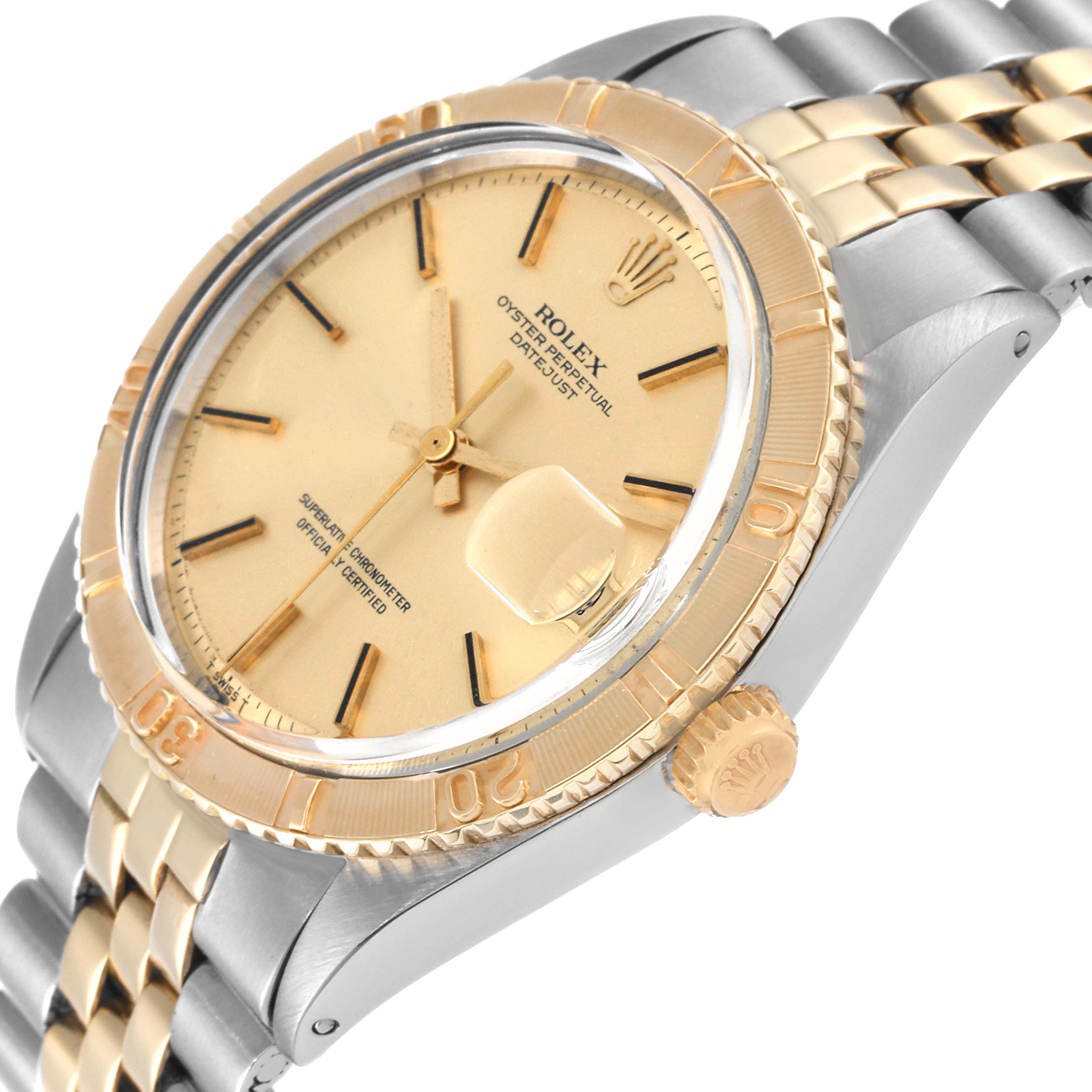 This image shows a close-up of the Rolex Turn-o-Graph 1625 Men's Steel and Gold (two tone) Silver Dial 1625 Men's Steel and Gold (two tone) Silver Dial watch's face, bezel, and part of the bracelet at an angle.
