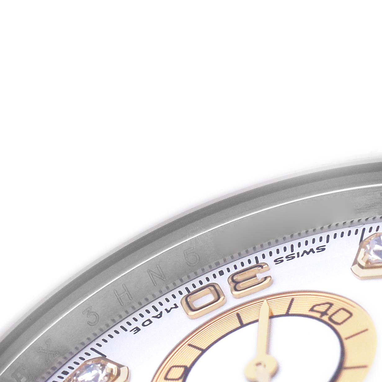 The image shows a close-up of the dial and bezel edge of a Rolex Daytona 116523 Men's Steel and Gold (two tone) Yellow Dial watch, highlighting the numbers and markers.