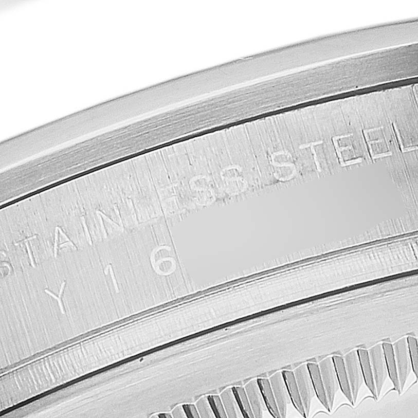 The image shows a close-up of the case back and serial number of a Rolex Explorer 114270 Men
s Stainless Steel Black Dial 114270 Men
s Stainless Steel Black Dial watch.