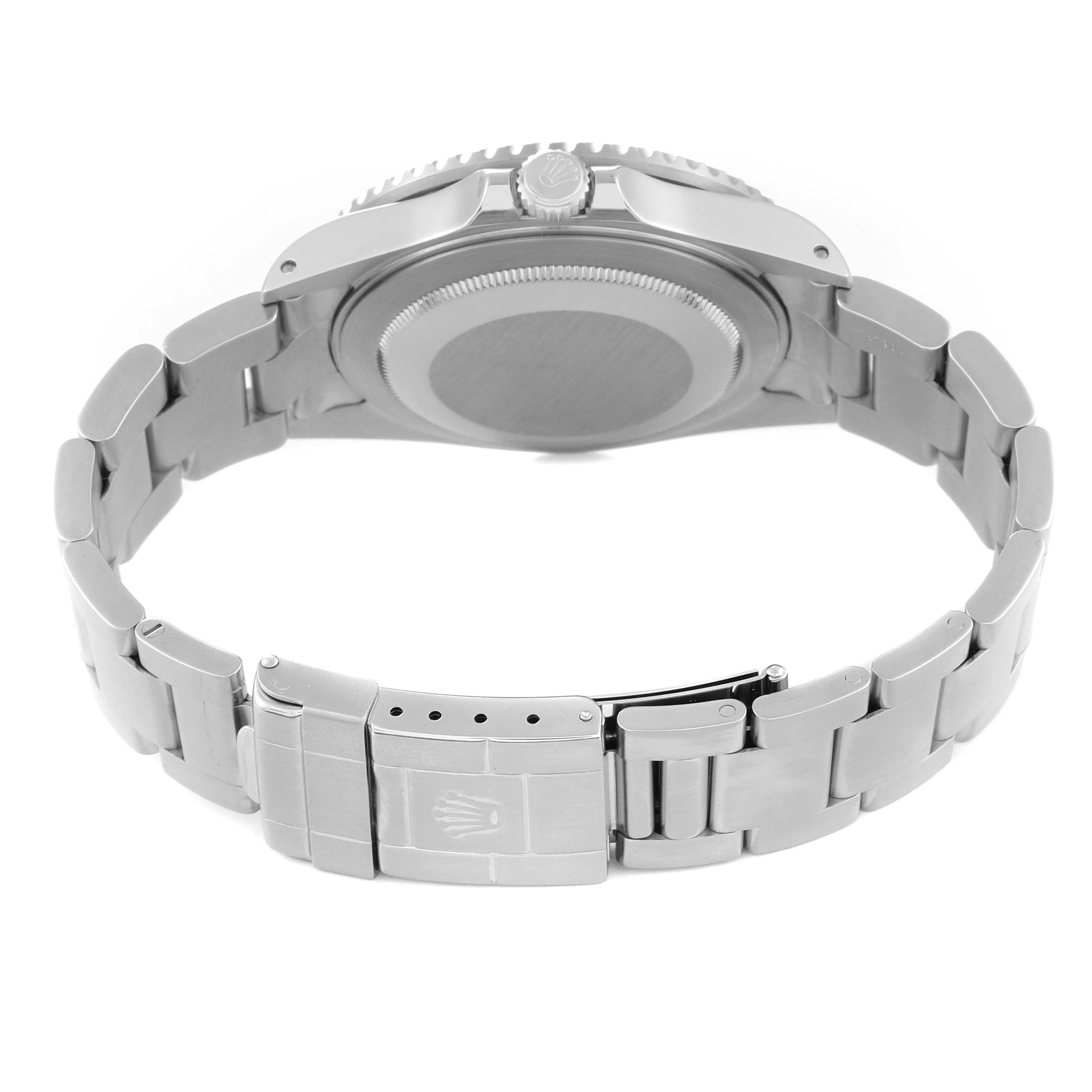 The image shows the backside of a Rolex GMT-Master 16710 Men
s Stainless Steel Black Dial 16710 Men
s Stainless Steel Black Dial watch, highlighting its clasp, bracelet, and caseback.