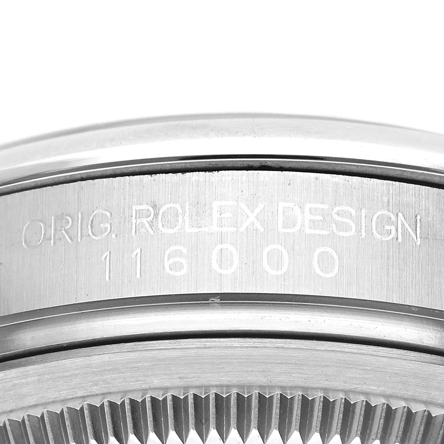 The image shows a close-up of the side of the bezel and case back of the Rolex Oyster Perpetual 116000 Men's Stainless Steel Black Dial 116000 Men's Stainless Steel Black Dial watch, with the design number "116000" engraved.