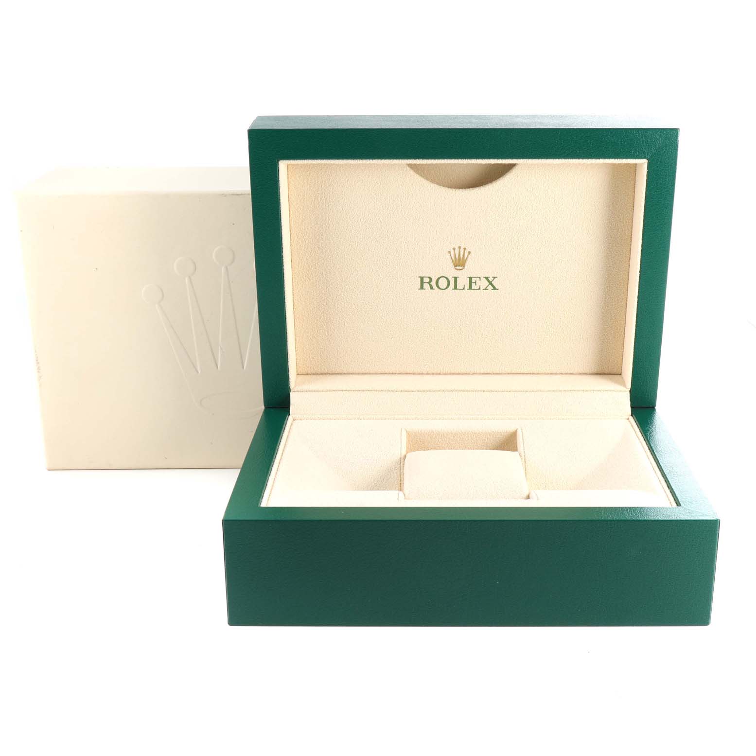 The image shows an open green and beige Rolex watch box for the Oyster Perpetual model.