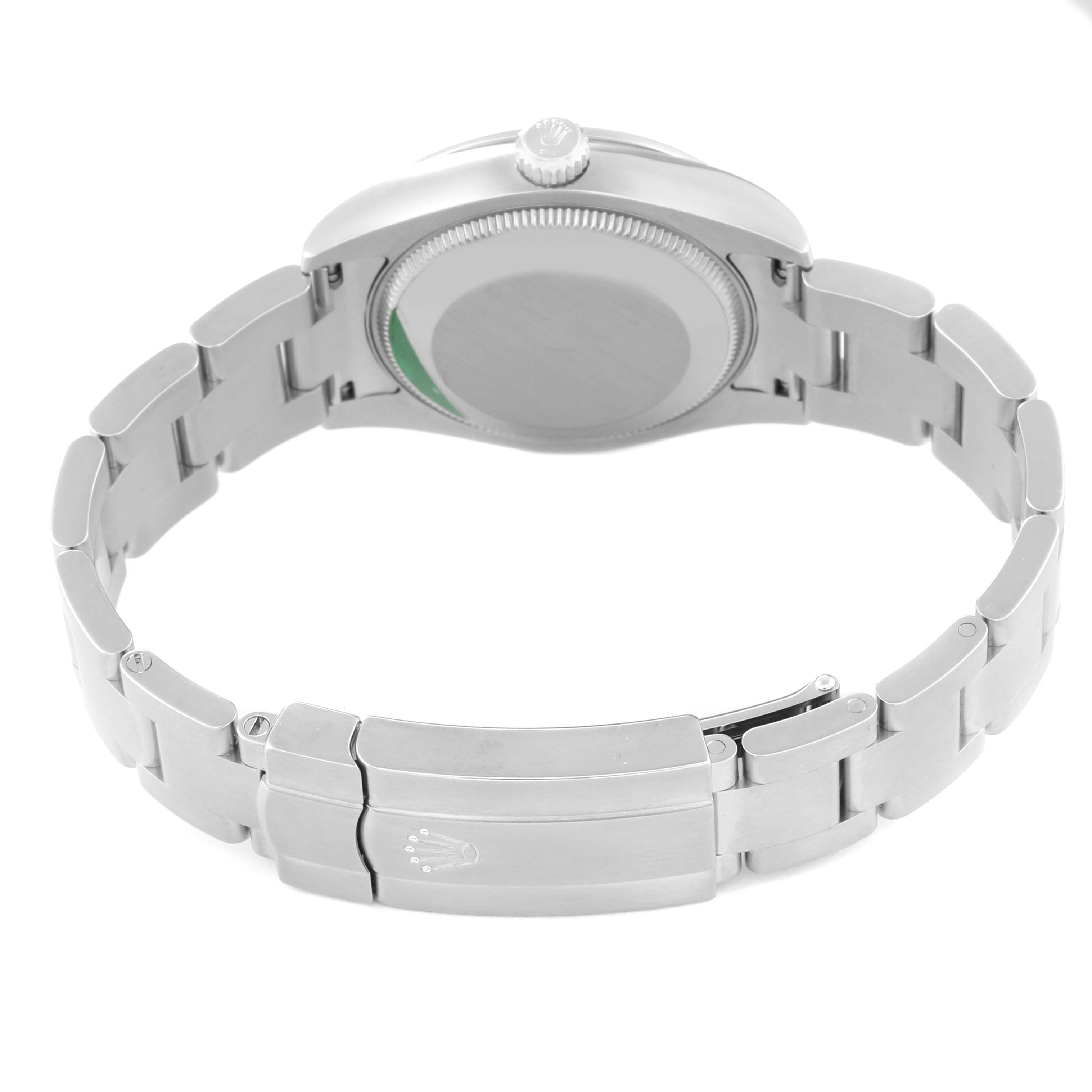 This image shows the back view of a Mid-Size Rolex watch, highlighting the clasp, bracelet, and case back.