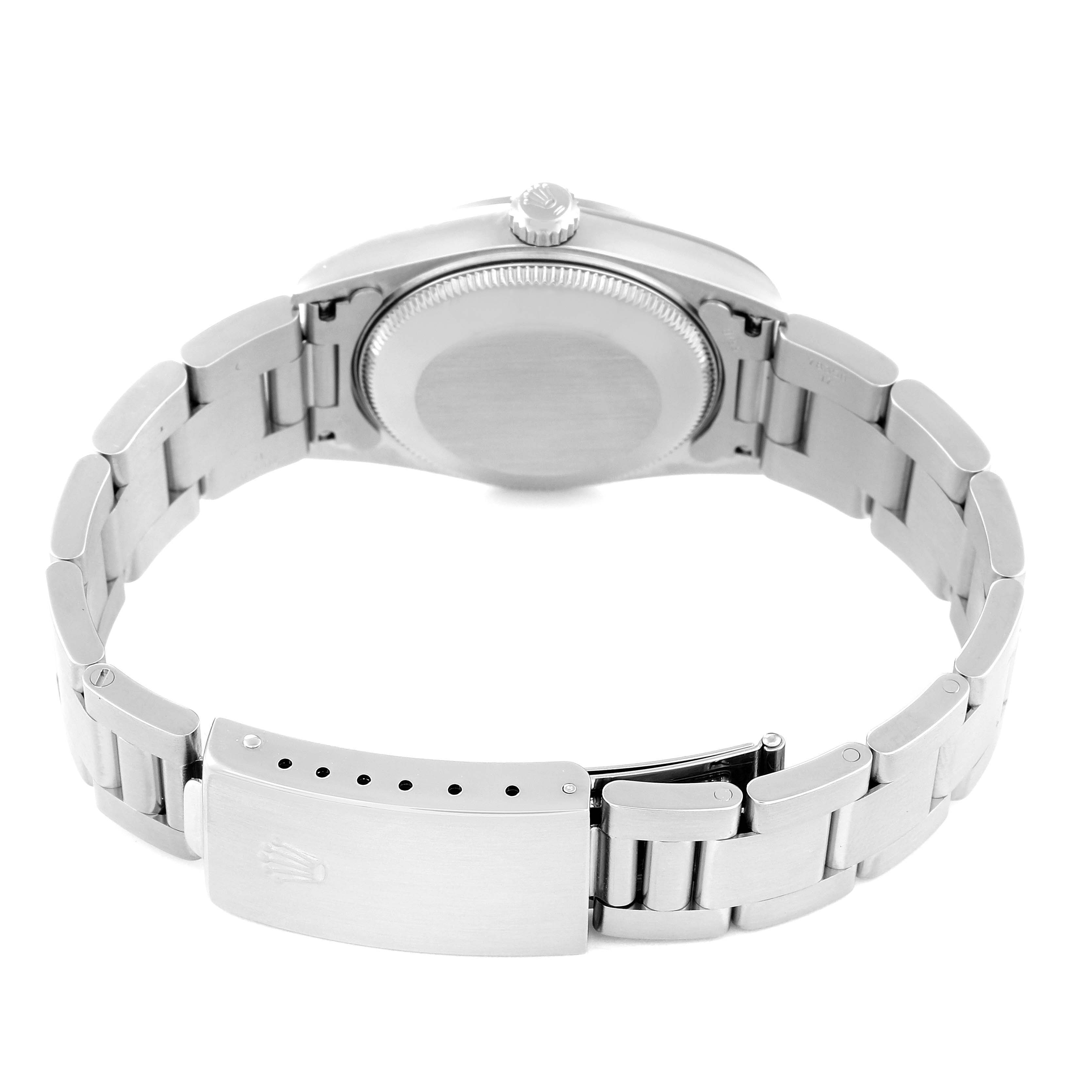 The image shows the back and clasp of a Mid-Size Rolex watch, focusing on the bracelet and case back.