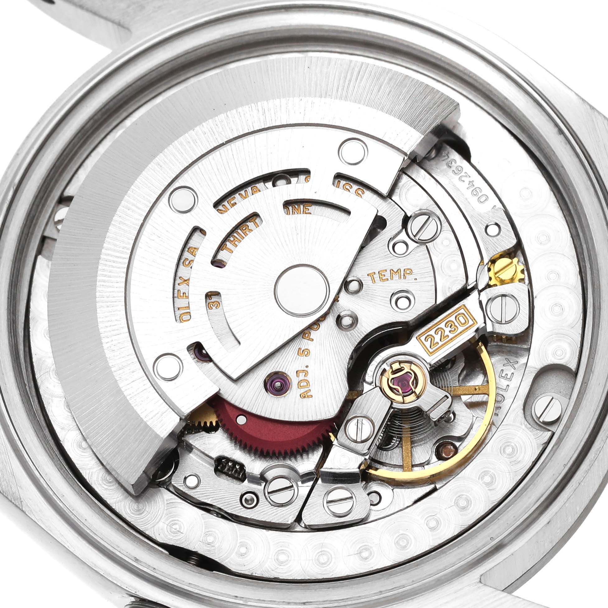This image shows the internal mechanism of a Rolex Mid-Size 77080 Women's Stainless Steel Pink Dial 77080 Women's Stainless Steel Pink Dial model watch from a top-down angle.