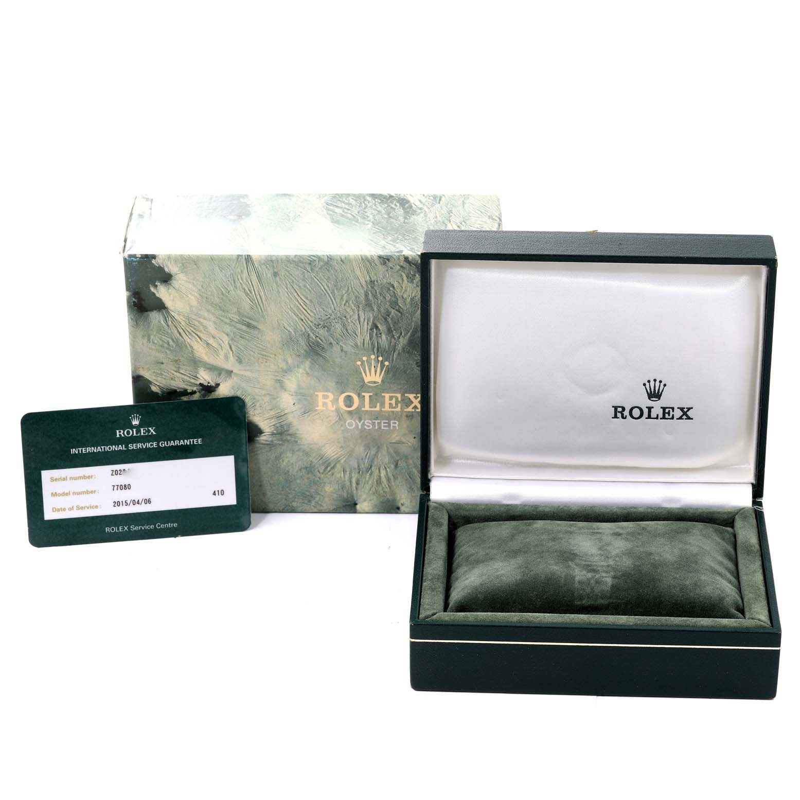 The image shows a Rolex Mid-Size 77080 Women
s Stainless Steel Pink Dial 77080 Women
s Stainless Steel Pink Dial model
s box, an open green watch case, an international service guarantee card, and packaging.