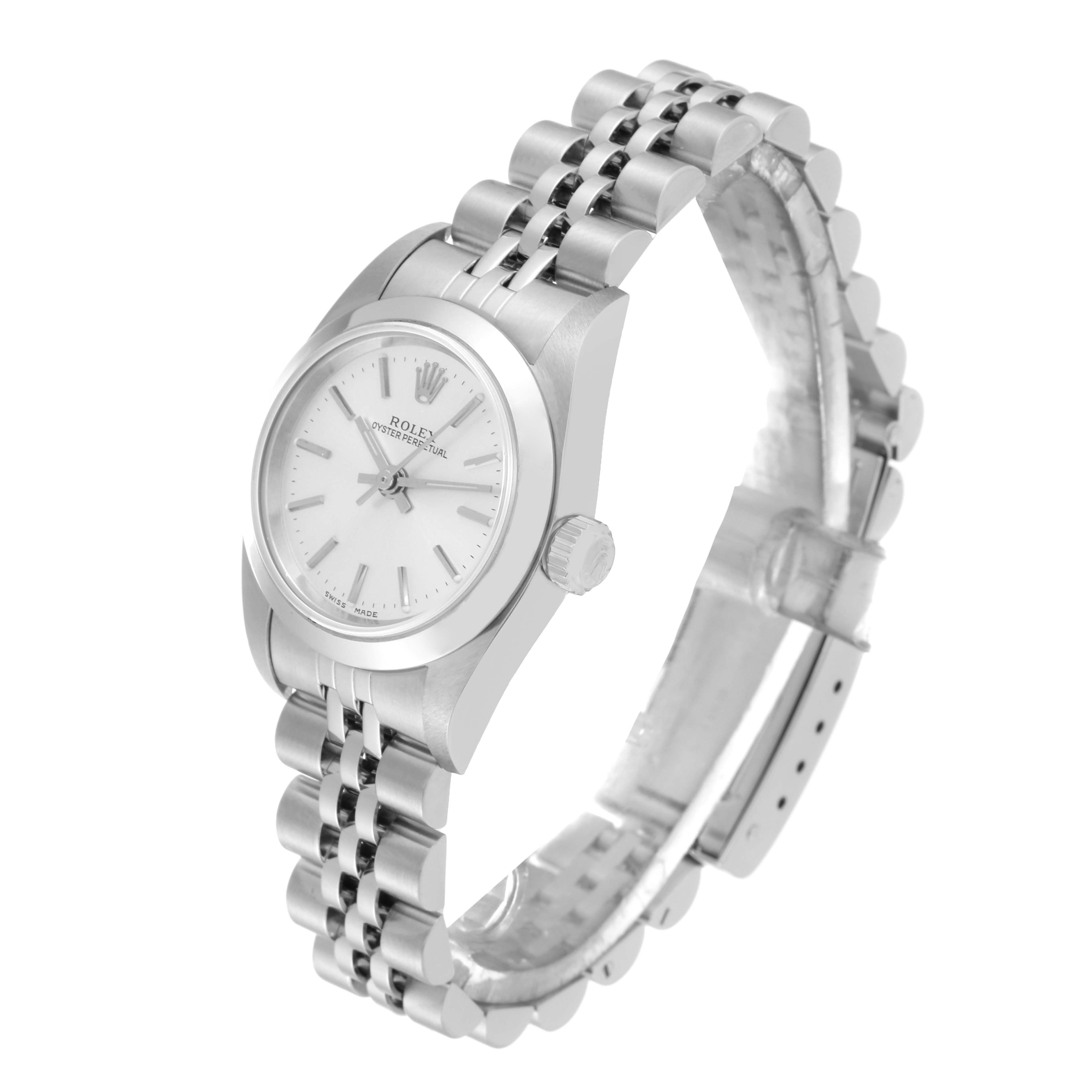 This image shows a side angle of a Rolex Oyster Perpetual 76080 Women's Stainless Steel Silver Dial 76080 Women's Stainless Steel Silver Dial watch, highlighting the watch face, crown, and metal bracelet.