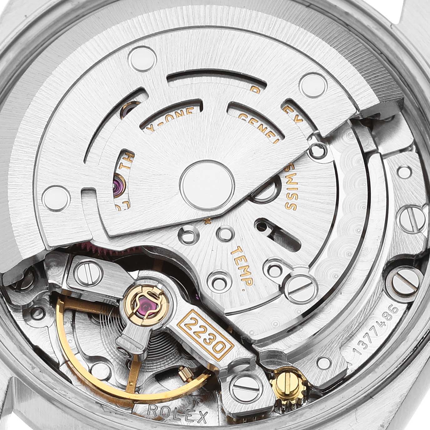This is a close-up view showing the internal movement mechanism of a Rolex Oyster Perpetual 76080 Women's Stainless Steel Silver Dial 76080 Women's Stainless Steel Silver Dial watch.