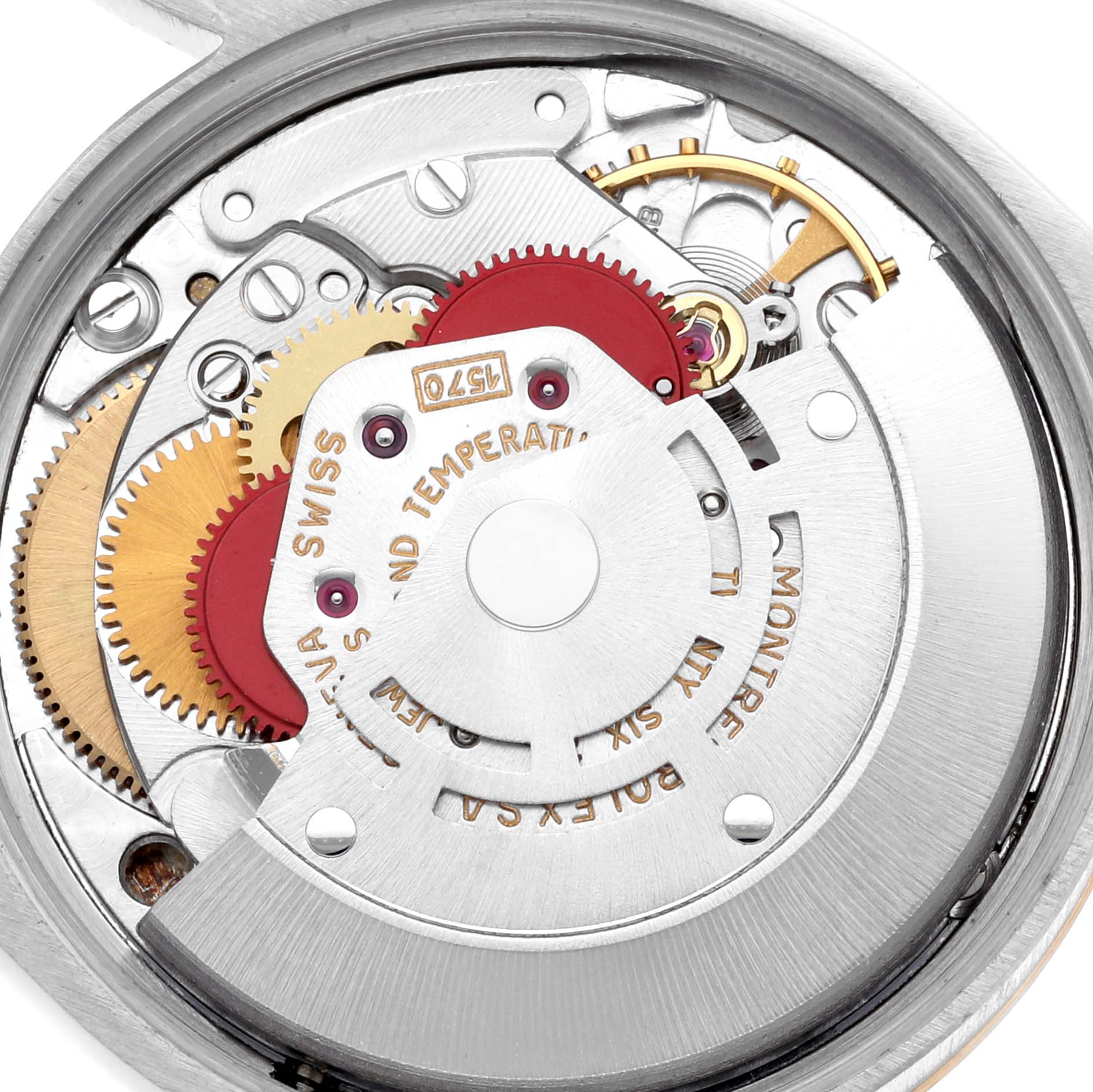 This image shows the internal movement of a Rolex Vintage Collection 1005 Men's Steel and Gold (two tone) Champagne Dial 1005 Men's Steel and Gold (two tone) Champagne Dial watch, highlighting gears and the rotor at a top-down angle.