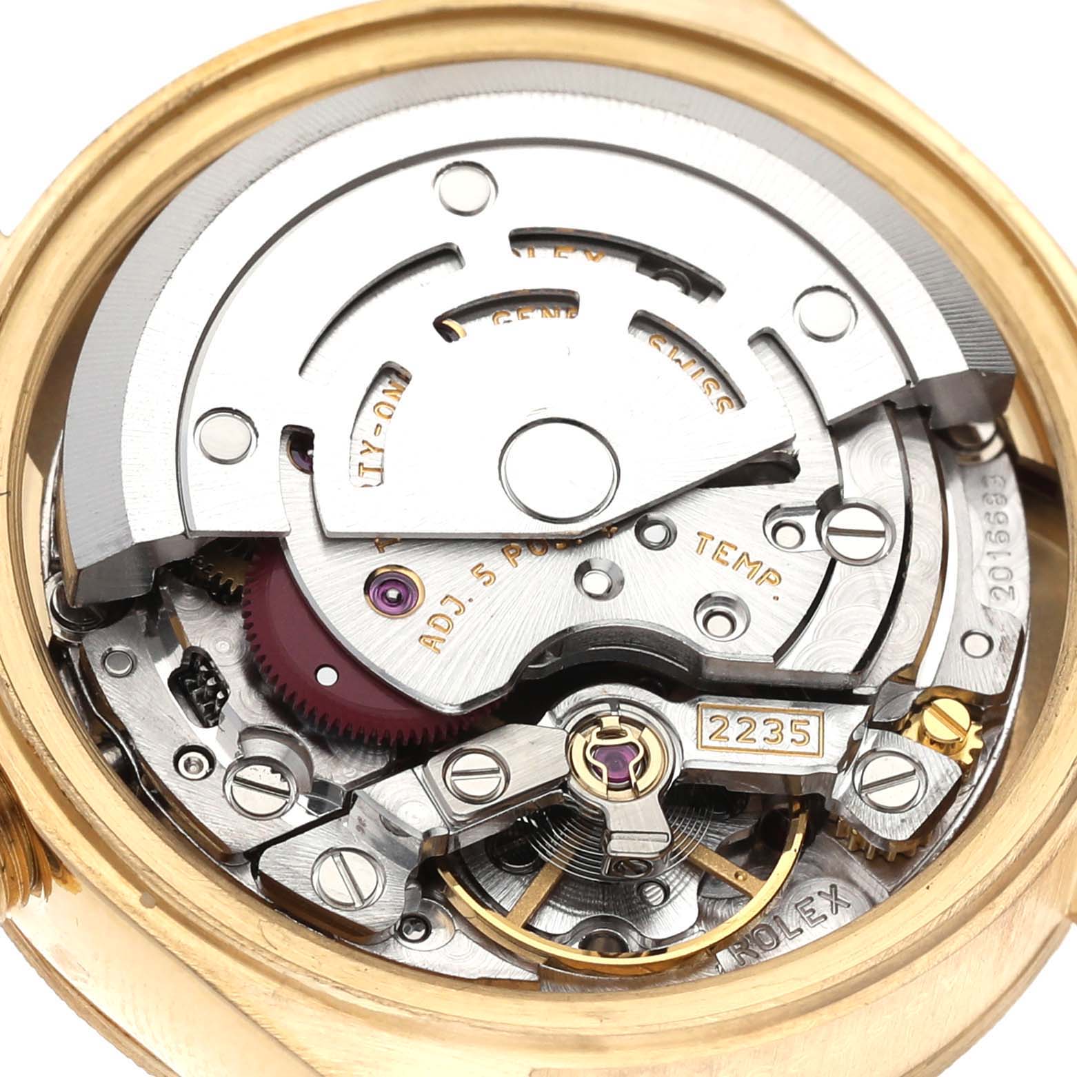 This is a close-up view of the internal mechanism of a Rolex President 79278 Women's Yellow Gold Champagne Dial 79278 Women's Yellow Gold Champagne Dial watch, showcasing its intricate movement and components.