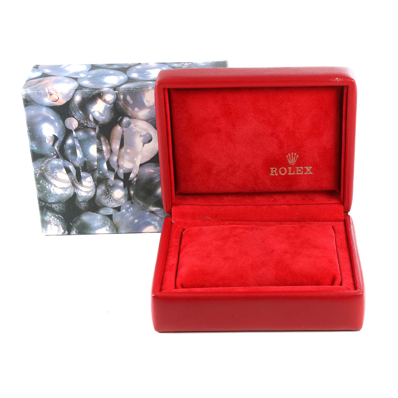 The image shows a red Rolex watch box for the President model, with the interior and exterior packaging visible.