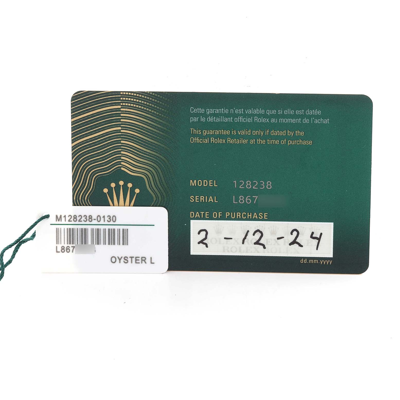 The image shows the warranty card and tag for a Rolex President 128238 Men's Yellow Gold Green Dial 128238 Men's Yellow Gold Green Dial model, displaying model, serial number, and purchase date.