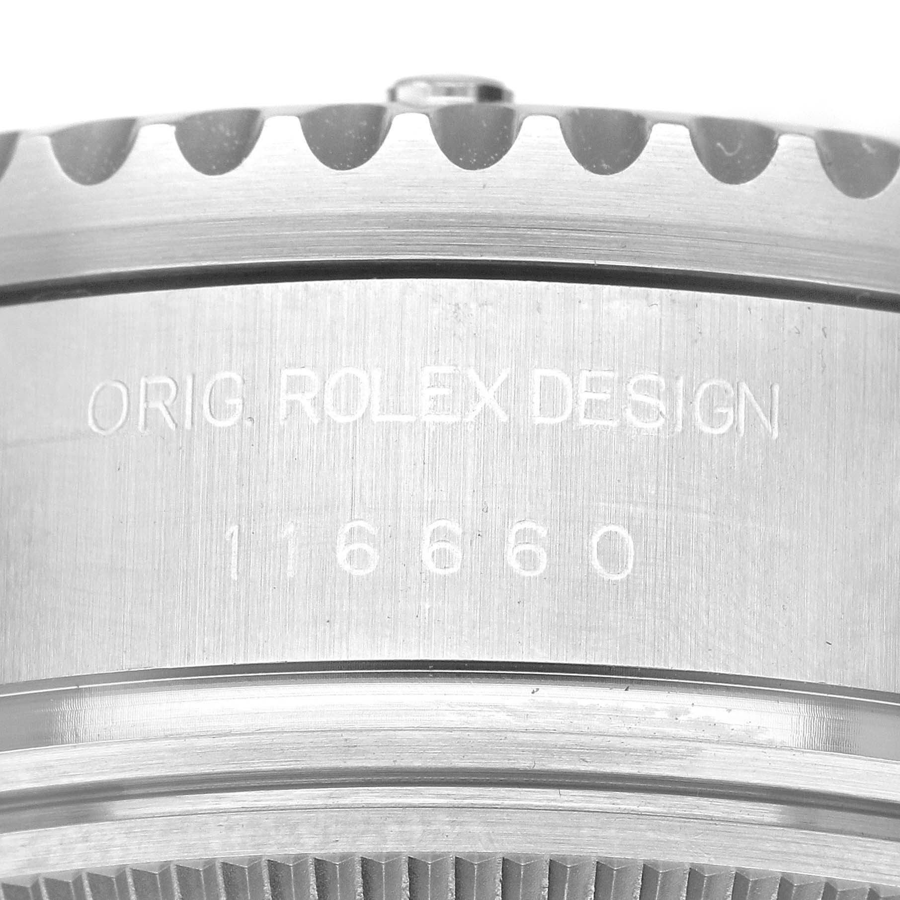 The image shows a close-up of the back edge of a Rolex Sea-Dweller 116660 Men
s Stainless Steel Black Dial 116660 Men
s Stainless Steel Black Dial watch, displaying the model number and "ORIG. ROLEX DESIGN" engraving.