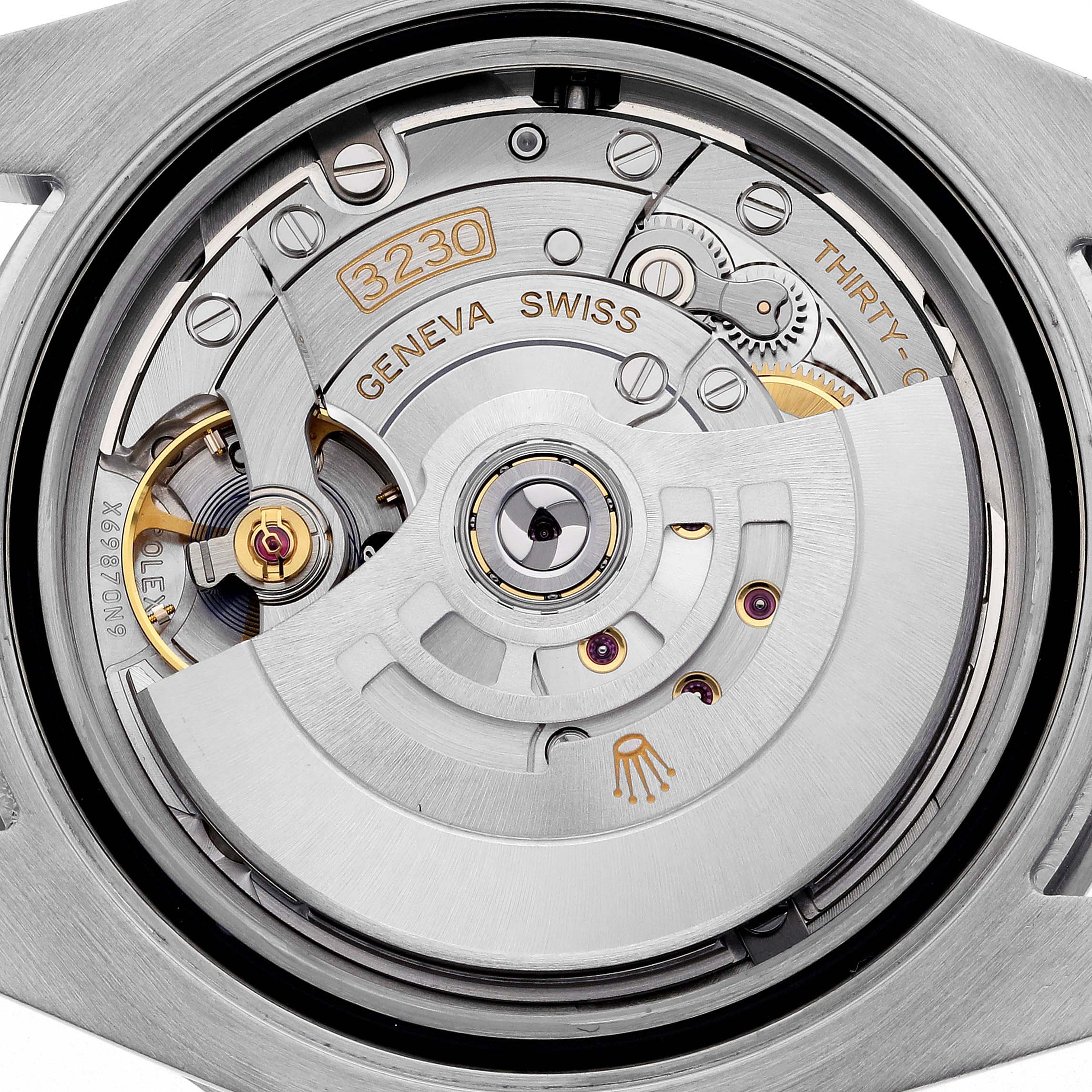 The image shows the movement mechanism of a Rolex Submariner 124060 Men's Stainless Steel Black Dial 124060 Men's Stainless Steel Black Dial, featuring the intricate gears and oscillating weight from a top angle.