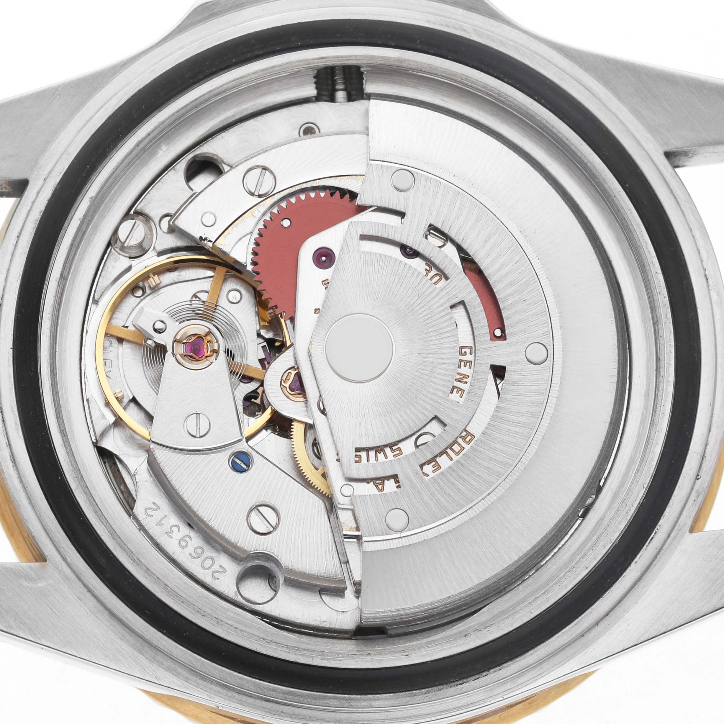 The image shows the internal movement mechanism of a Rolex Submariner 16803 Men's Steel and Gold (two tone) Blue Dial watch from a top-down angle.