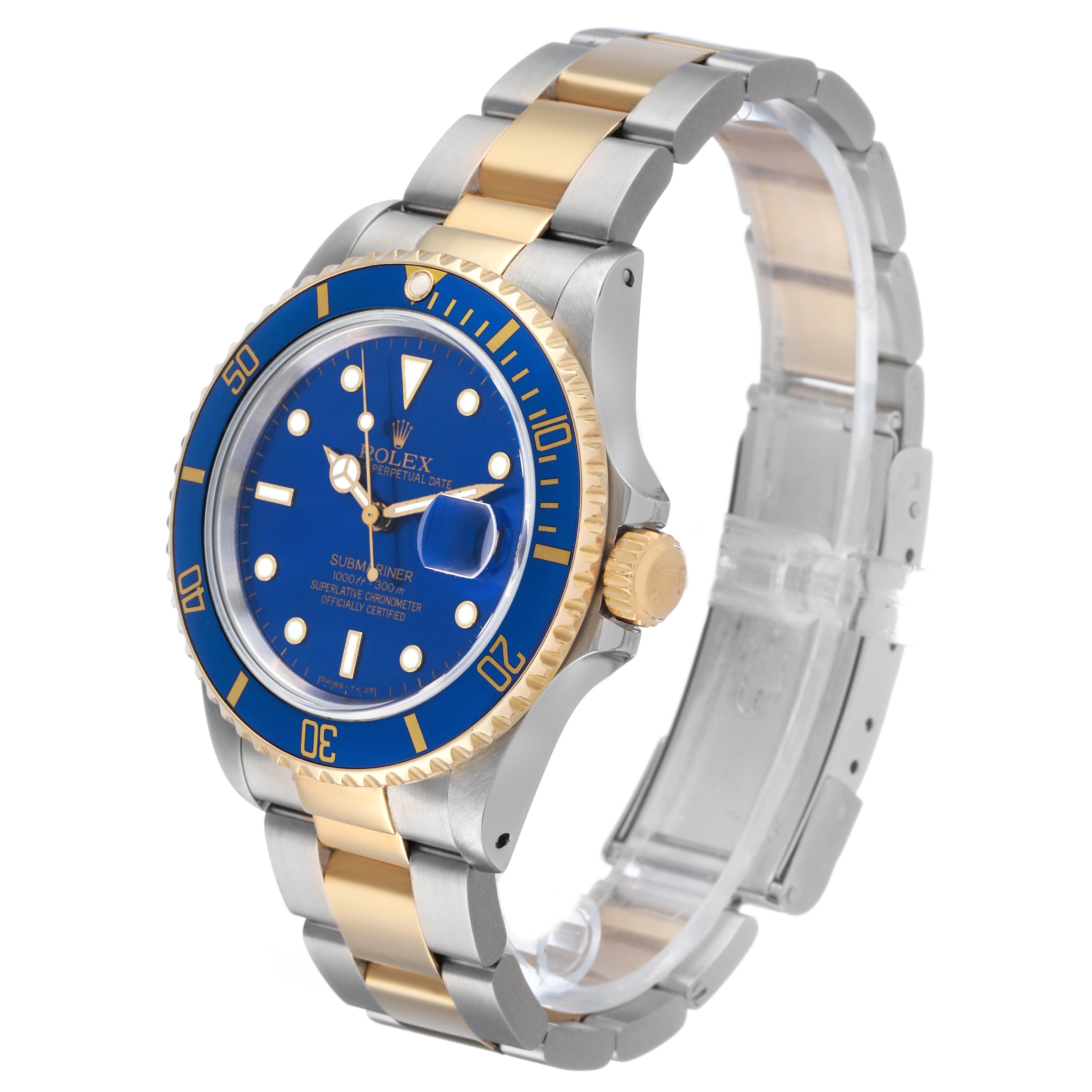 The Rolex Submariner 16803 Men's Steel and Gold (two tone) Blue Dial watch is shown at a three-quarter angle, featuring its dial, bezel, and bracelet clearly.