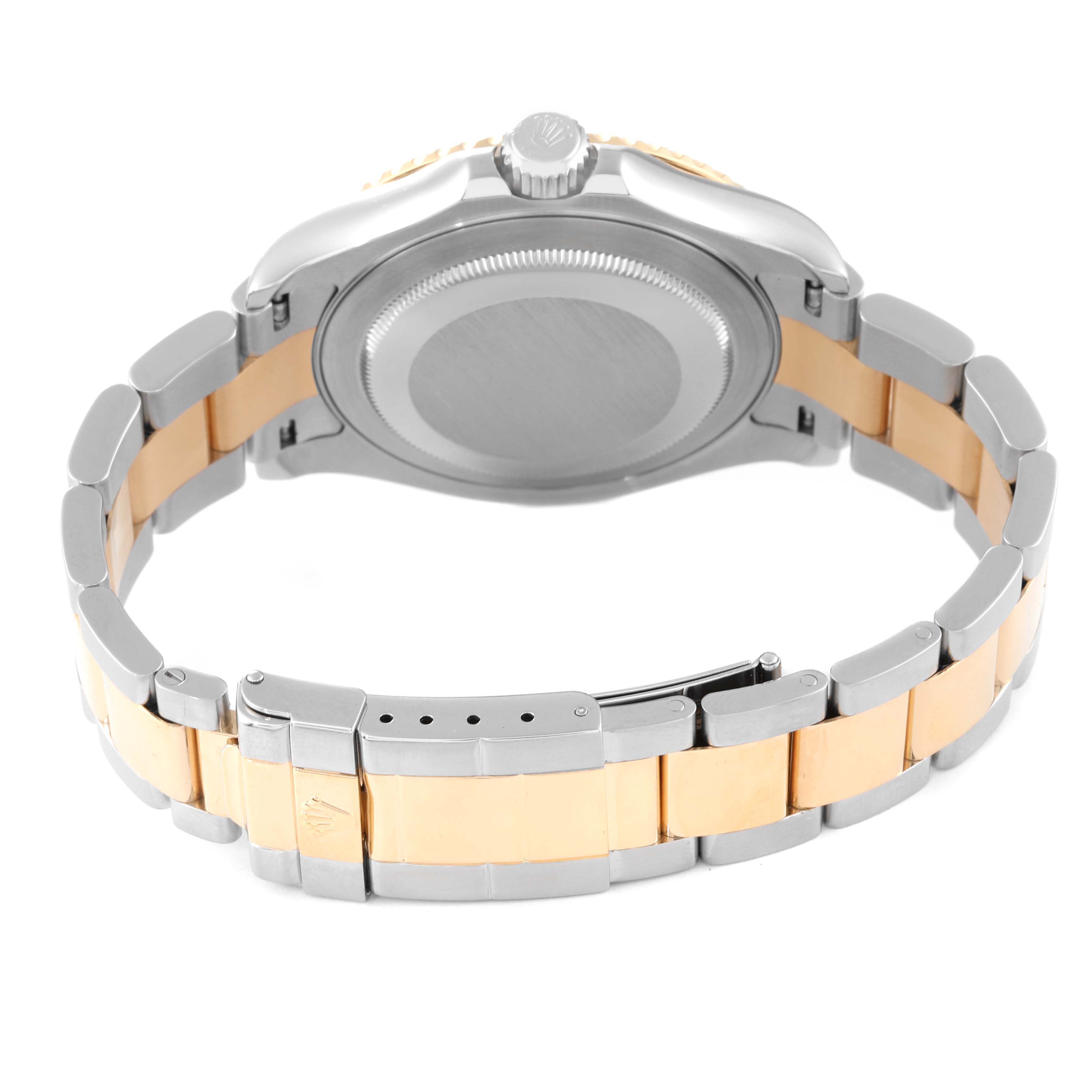 This image shows the back case and clasp of a Rolex Yacht-Master 16623 Men's Steel and Gold (two tone) Champagne Dial 16623 Men's Steel and Gold (two tone) Champagne Dial watch from an angled view.