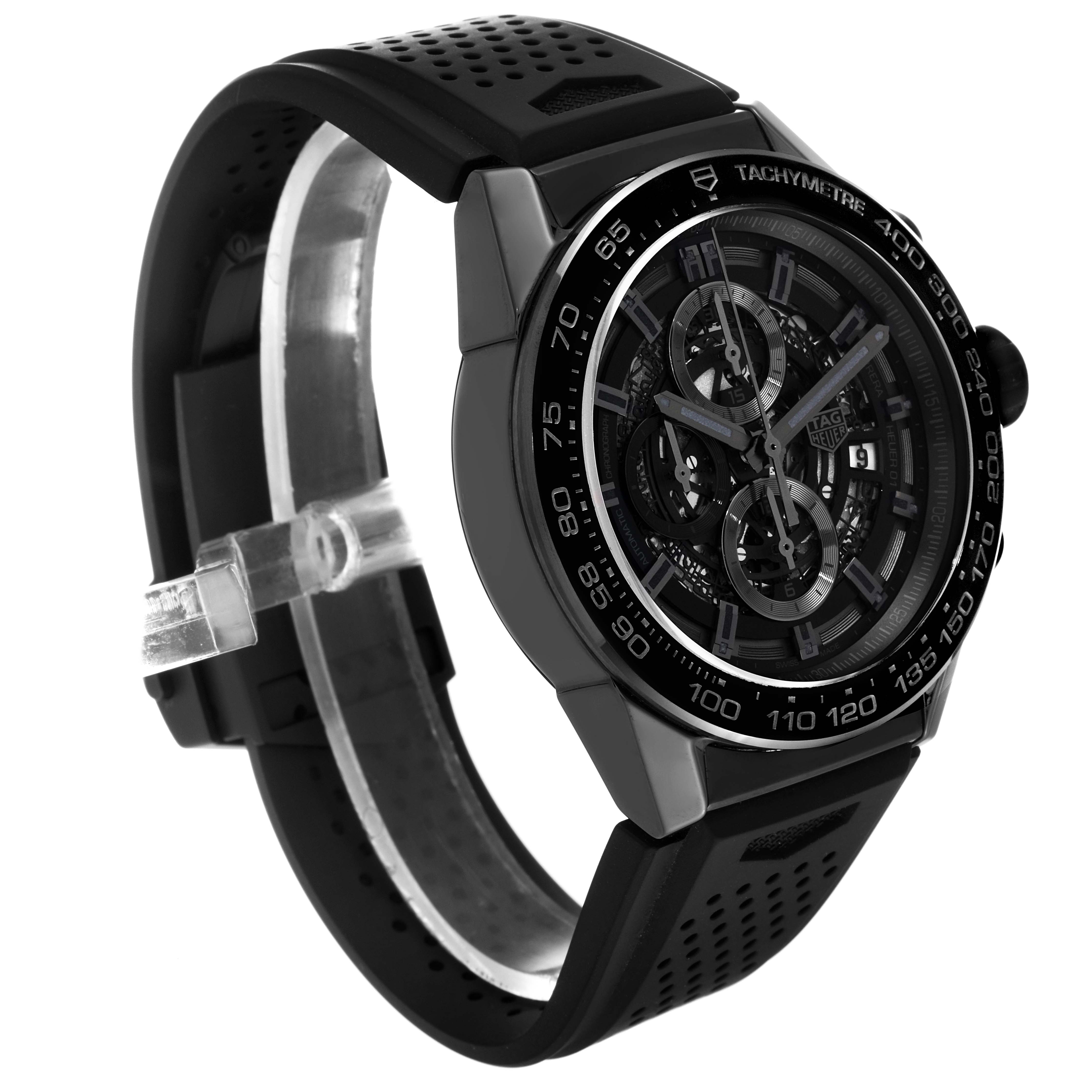 The image shows a Tag Heuer Carrera CAR2A90.FT6071 Men's Ceramic Black Dial CAR2A90.FT6071 Men's Ceramic Black Dial watch viewed at an angle from the front-left, featuring its dial, bezel, and rubber strap.