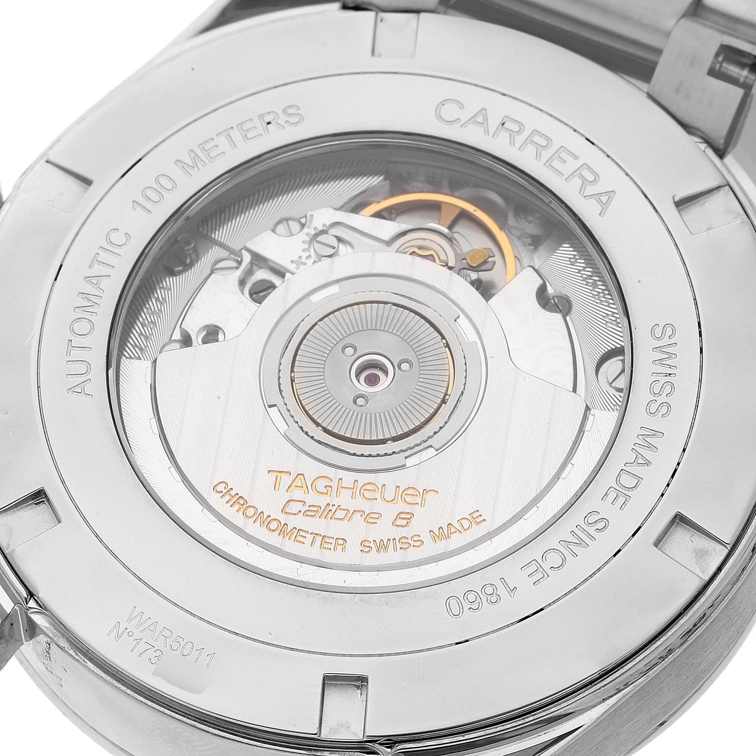 The image shows the Tag Heuer Carrera WAR5011.BA0723 Men's Stainless Steel Silver Dial WAR5011.BA0723 Men's Stainless Steel Silver Dial watch's transparent case back, revealing the automatic movement and inner mechanisms.