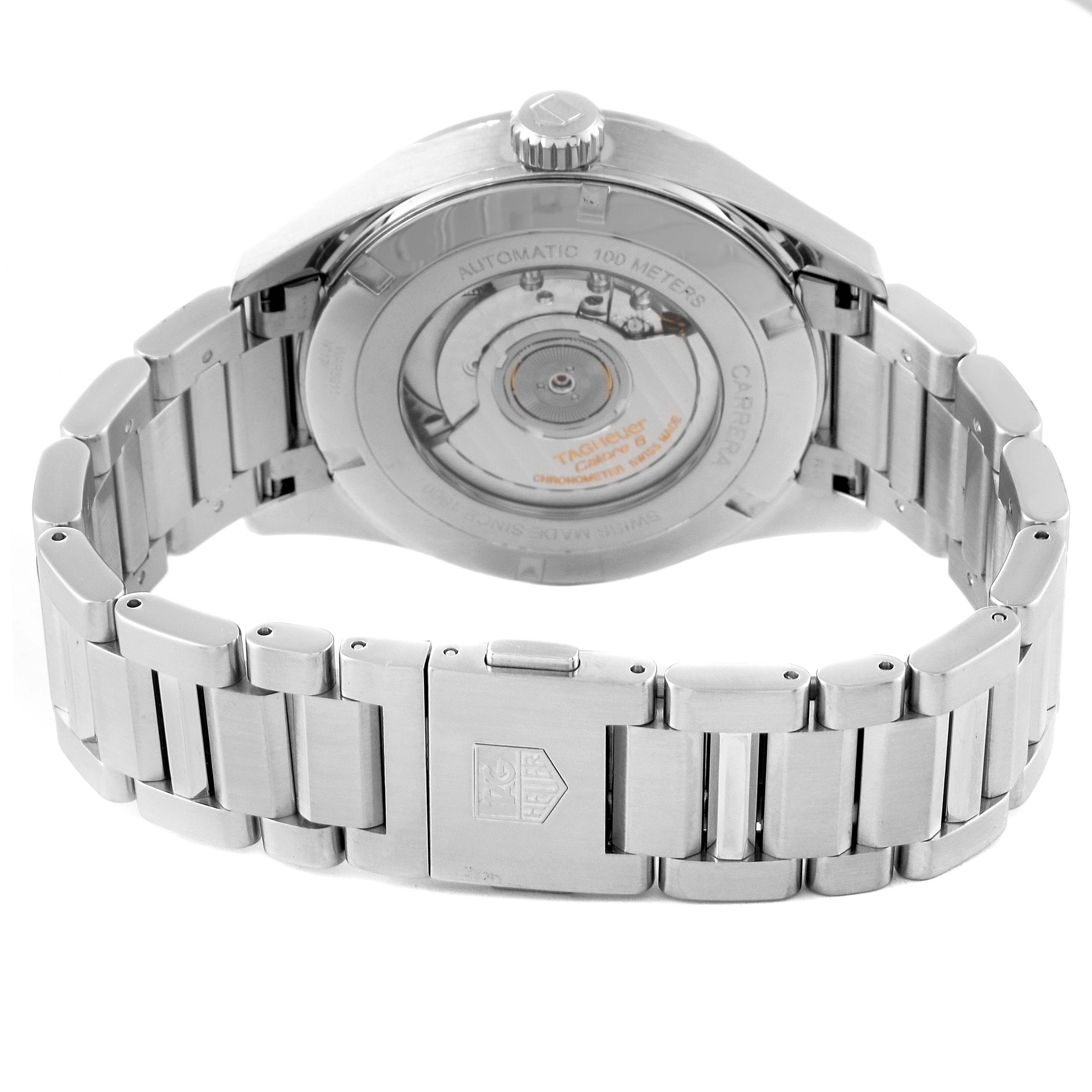 The image displays the back view of the Tag Heuer Carrera WAR5011.BA0723 Men's Stainless Steel Silver Dial WAR5011.BA0723 Men's Stainless Steel Silver Dial watch, showcasing its automatic movement and stainless steel bracelet.