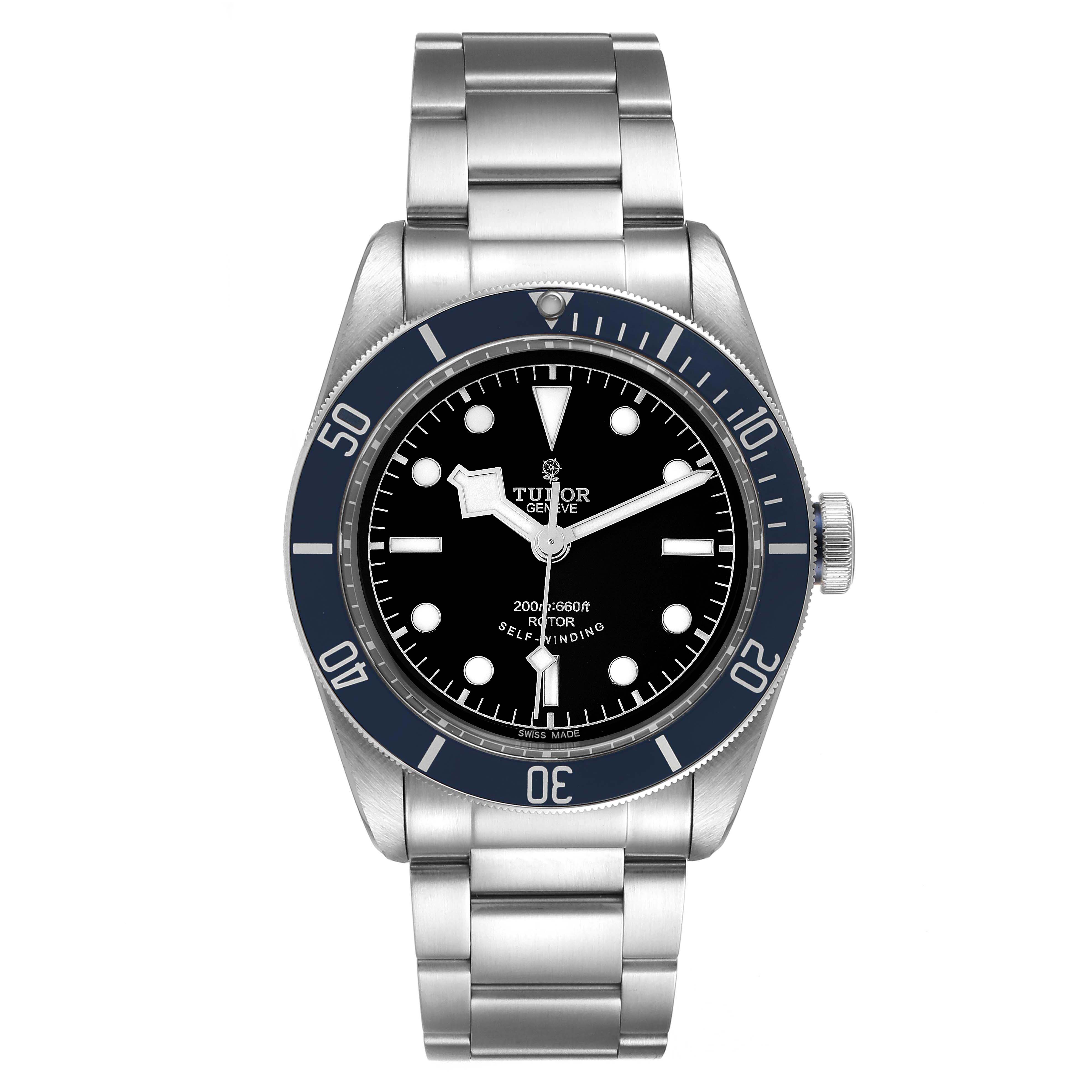The image shows a frontal view of the Tudor Heritage Black Bay 79220 Men
s Stainless Steel Black Dial 79220 Men
s Stainless Steel Black Dial watch, including the dial, bezel, hands, and stainless steel bracelet.