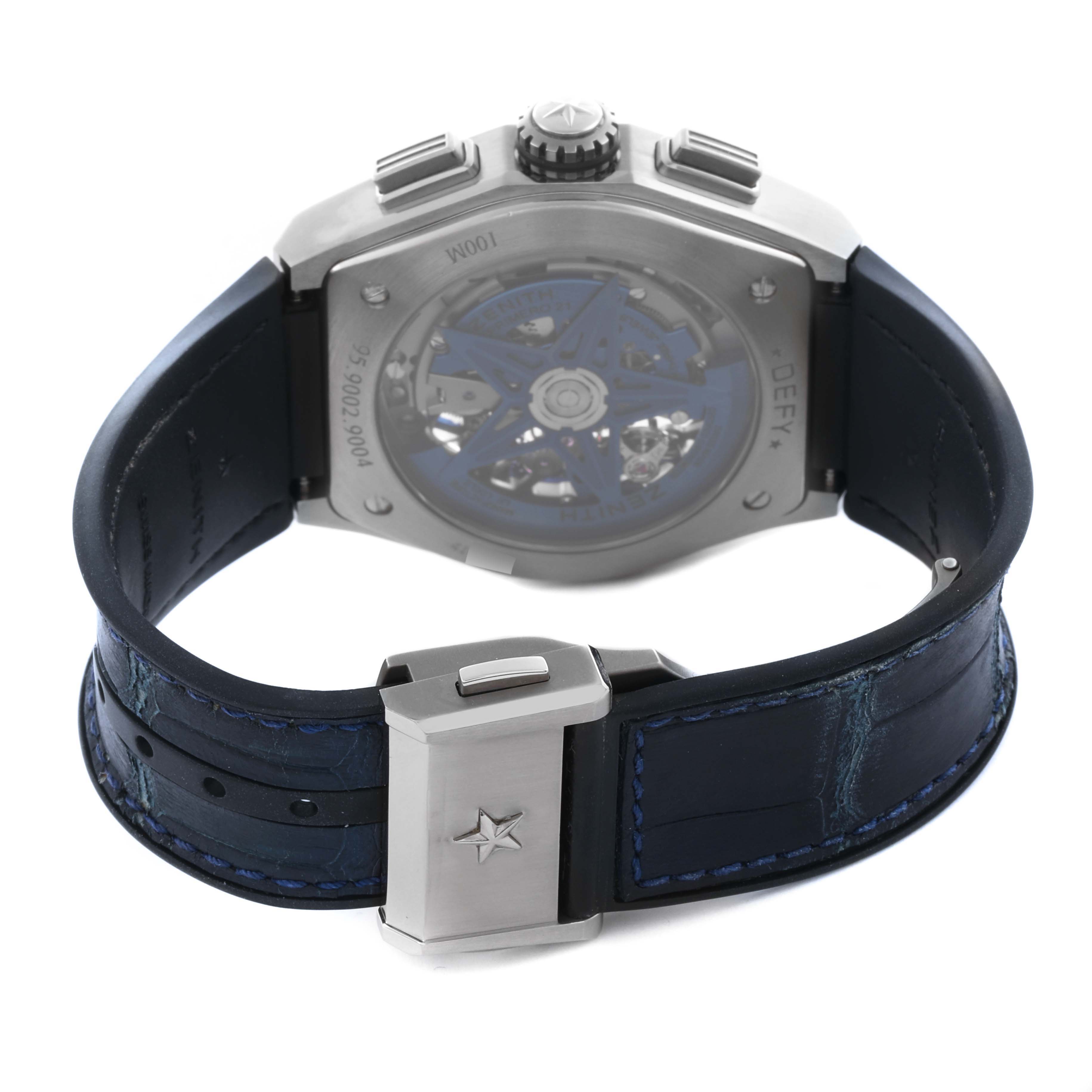 The Zenith El Primero 95.9002.9004/78.R584 Men
s Titanium Transparent Dial 95.9002.9004/78.R584 Men
s Titanium Transparent Dial watch is shown from the back, displaying the case back, strap, and clasp.