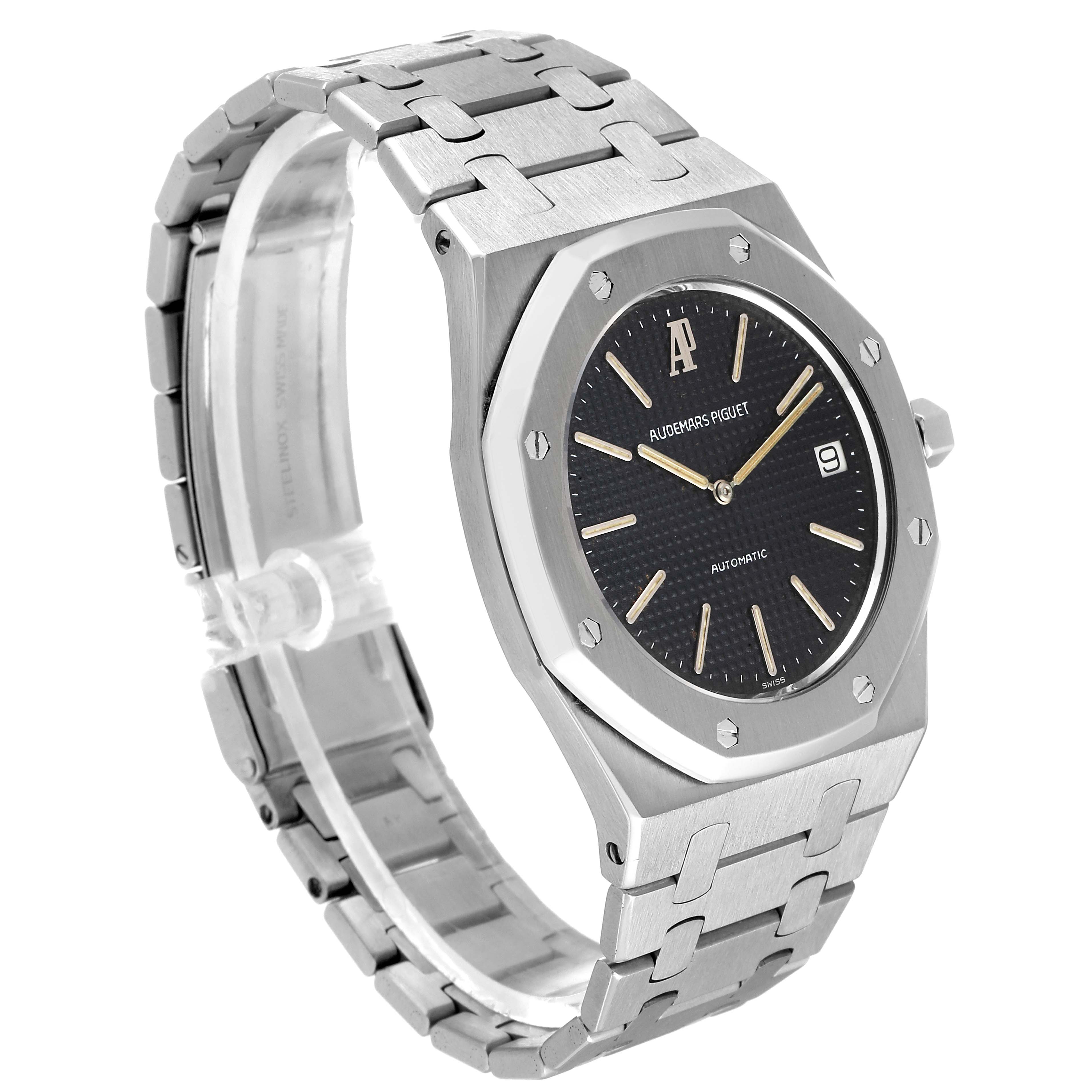 The image shows a side angle of the Audemars Piguet Royal Oak 5402ST Men's Stainless Steel Black Dial 5402ST Men's Stainless Steel Black Dial watch, displaying its case, bracelet, and dial clearly.