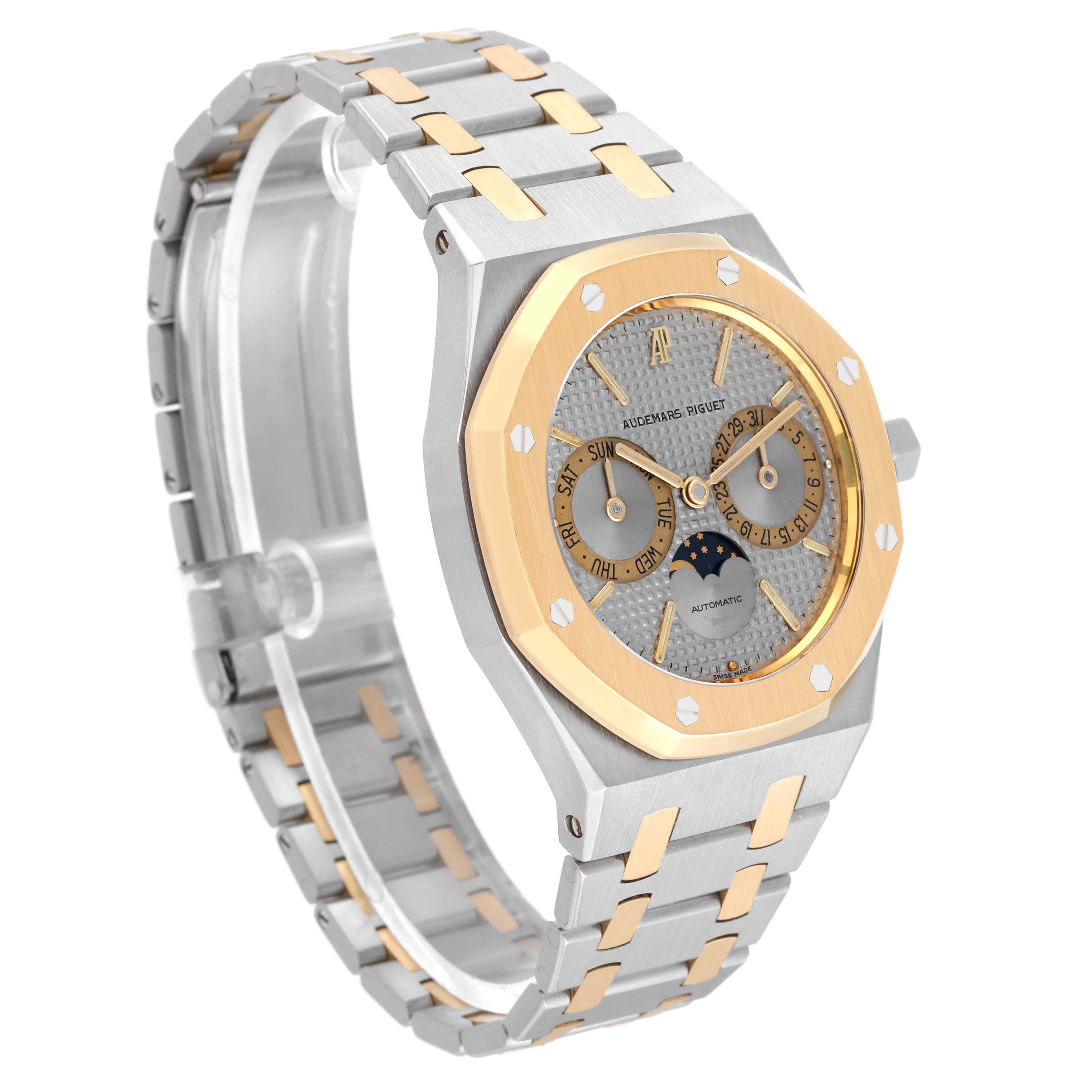 This image shows the front and side view of an Audemars Piguet Royal Oak 25594SA Men's Steel and Gold (two tone) Silver Dial 25594SA Men's Steel and Gold (two tone) Silver Dial watch with a two-tone metal bracelet and octagonal bezel.