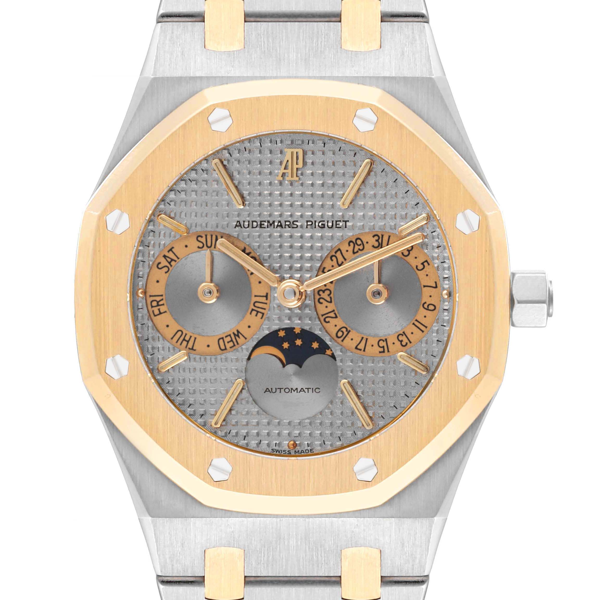 The image shows a front view of the Audemars Piguet Royal Oak 25594SA Men's Steel and Gold (two tone) Silver Dial 25594SA Men's Steel and Gold (two tone) Silver Dial watch, displaying the dial, crown, and part of the bracelet.