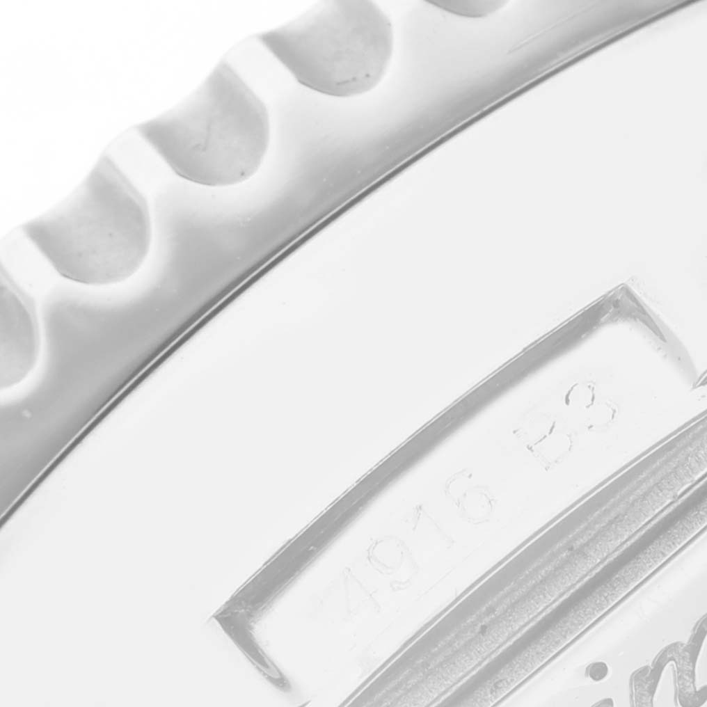 This close-up image shows the bezel and part of the engraving of a Limited Series model by Breitling.