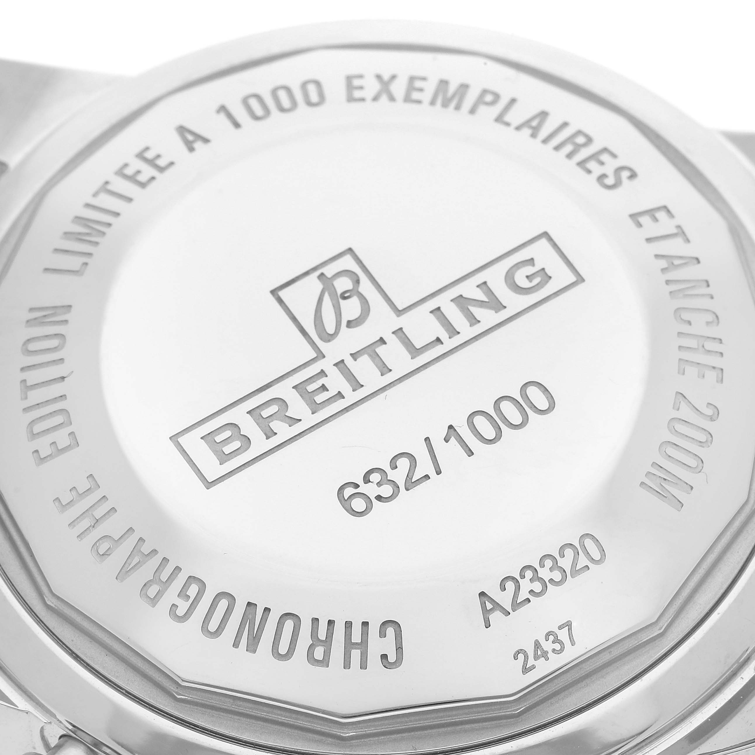 The image shows the back case of a Limited Series Breitling model, including the brand name, serial number, and edition details.