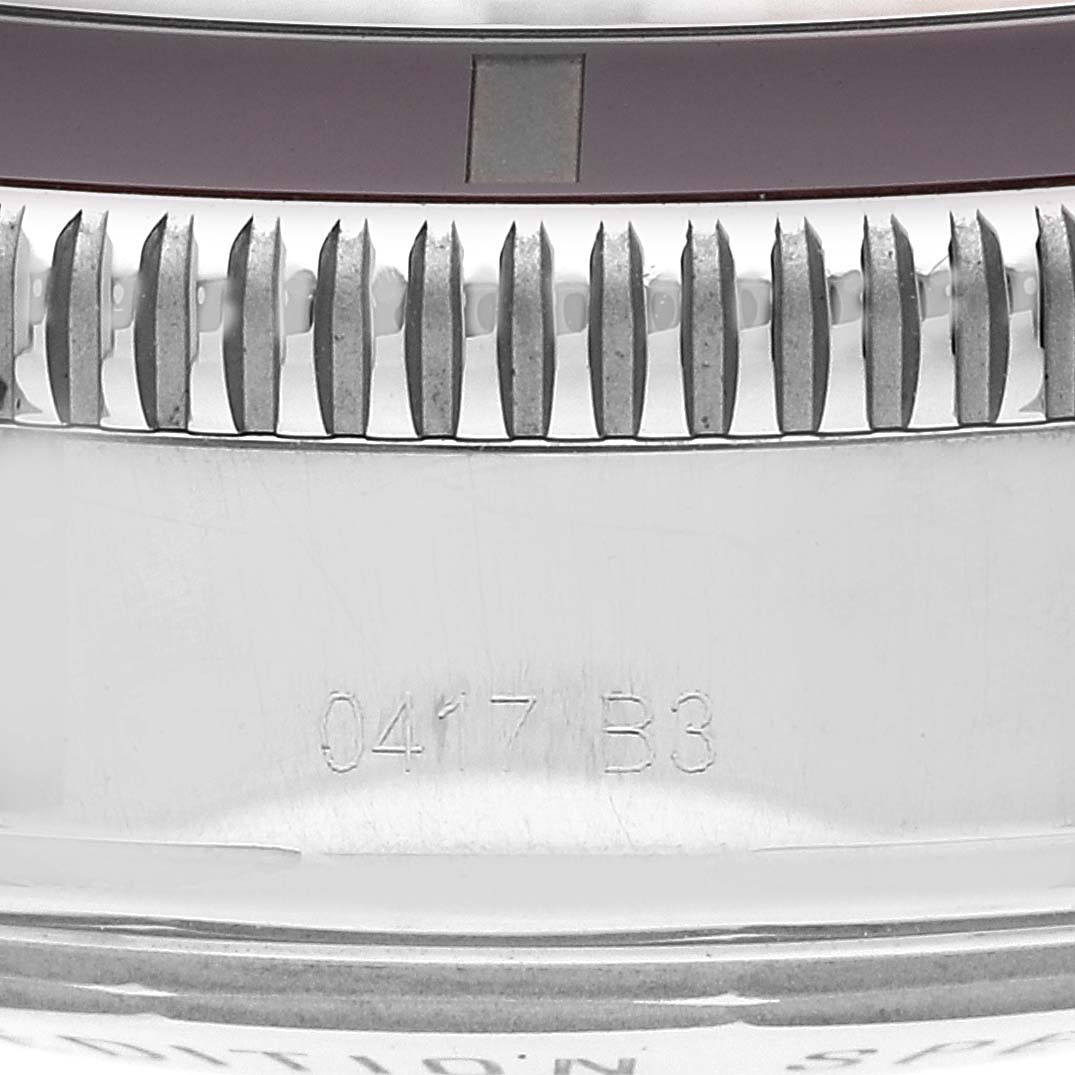 This close-up image shows the detailed side view of the bezel and part of the casing of a Breitling Superocean A13312 Men's Stainless Steel Brown Dial A13312 Men's Stainless Steel Brown Dial watch.
