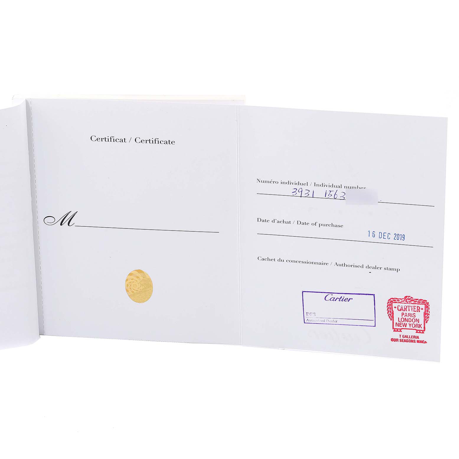 This image shows the certificate and authorized dealer stamp for the Drive de Cartier model by Cartier.