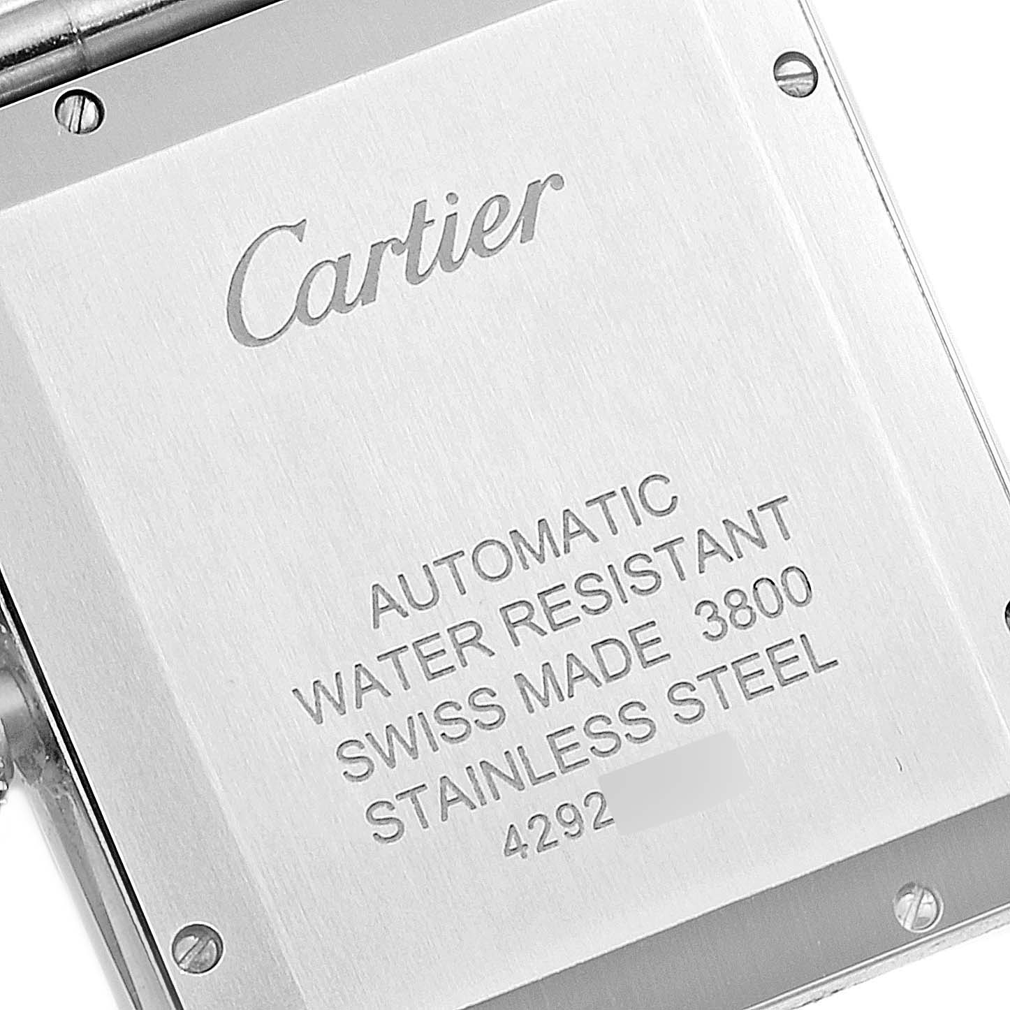 This image shows the back case of a Cartier Tank Solo W5200028 Men's Stainless Steel Silver Dial W5200028 Men's Stainless Steel Silver Dial watch with engraved details.