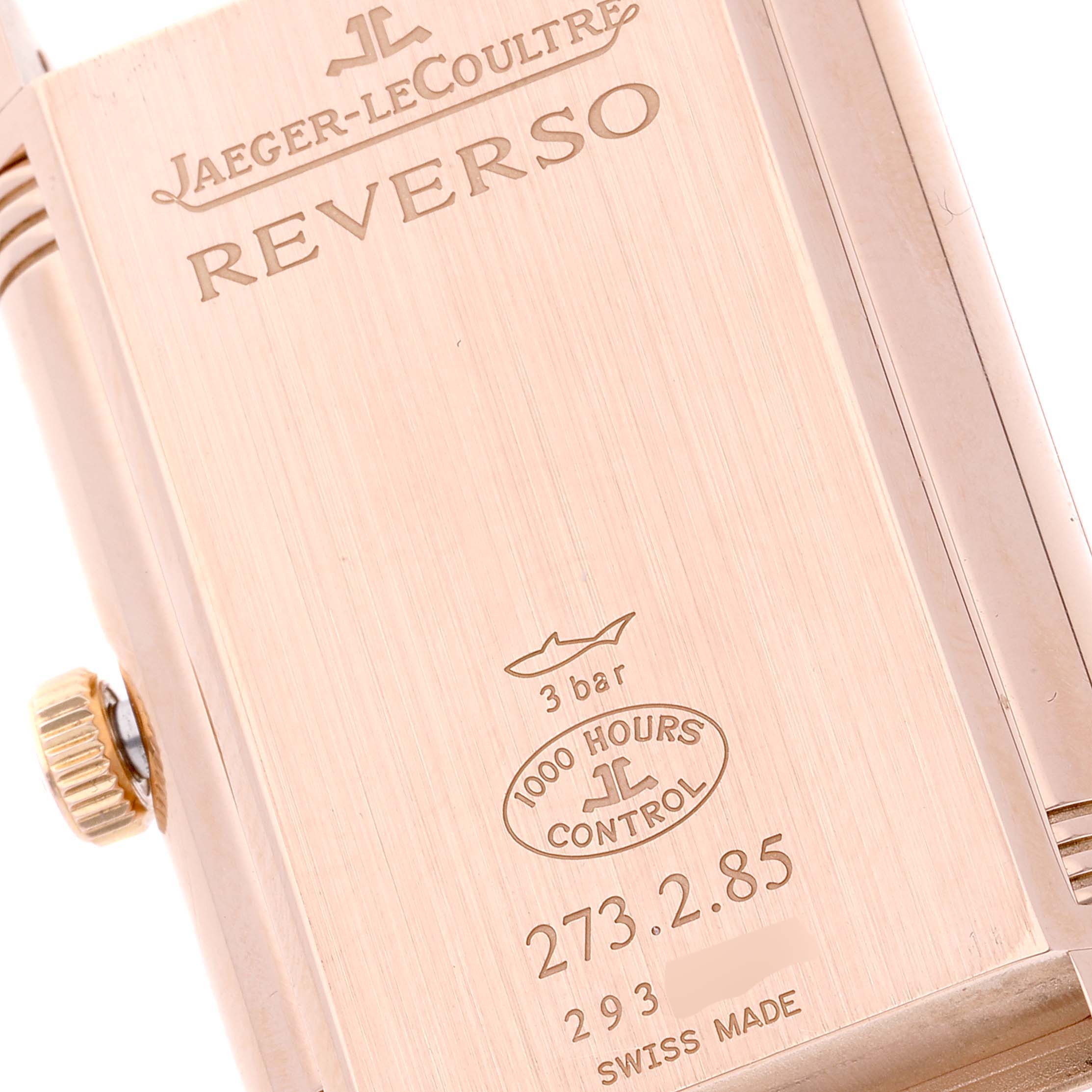 This image shows the back case of a Jaeger-LeCoultre Reverso watch at a close-up, angled slightly to the side.