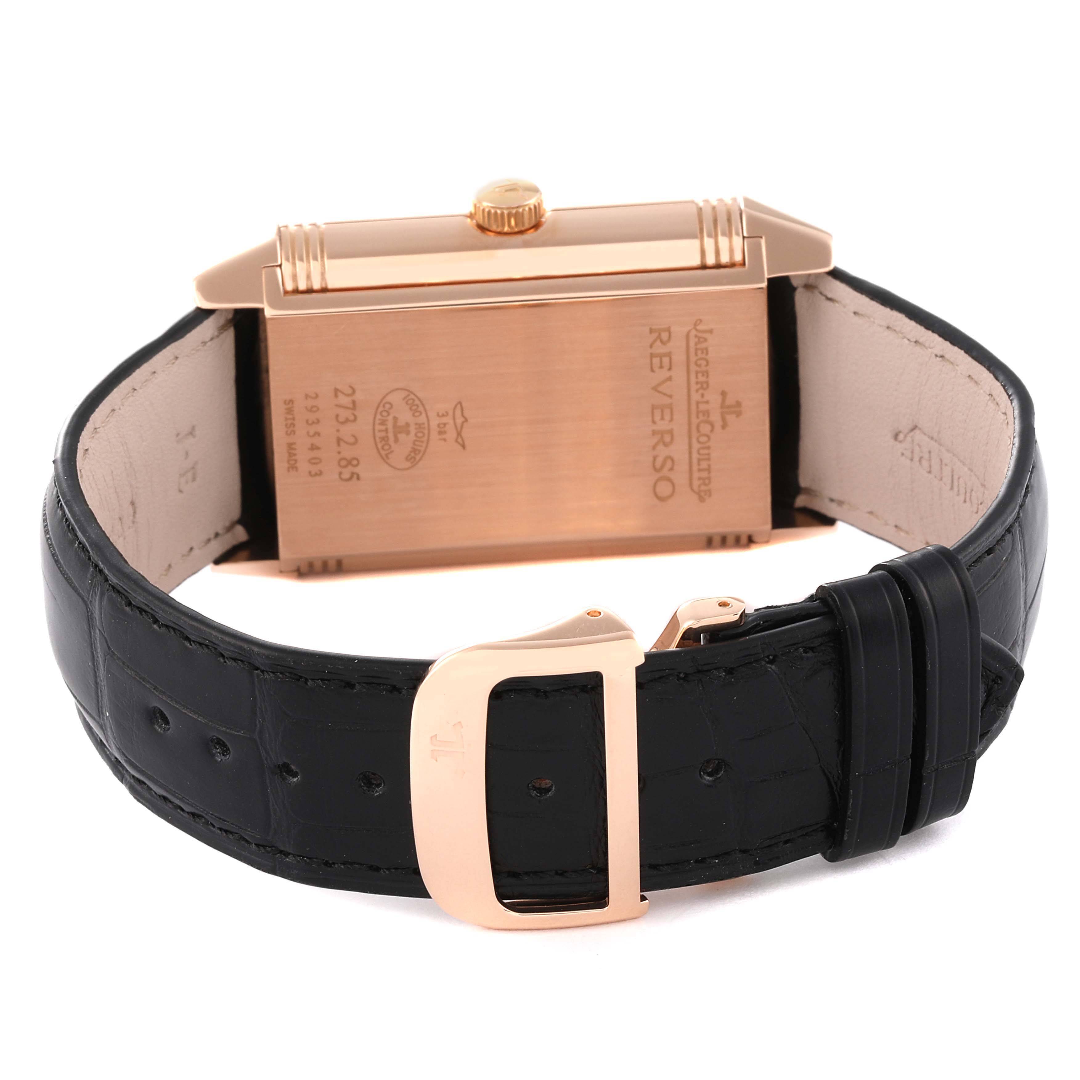 The image shows the back view of a Jaeger LeCoultre Reverso Q3742521 Men's Rose Gold Silver Dial Q3742521 Men's Rose Gold Silver Dial watch, displaying its case back and black leather strap.