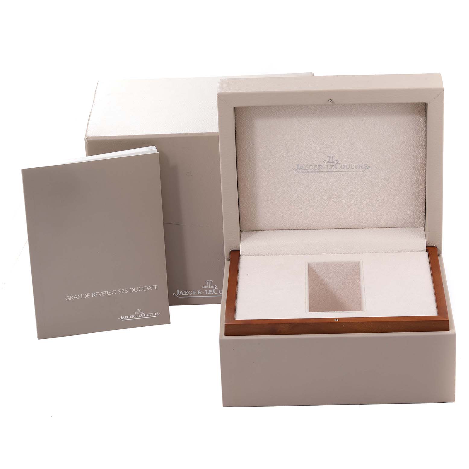 The image shows an open Jaeger LeCoultre Reverso Q3742521 Men's Rose Gold Silver Dial Q3742521 Men's Rose Gold Silver Dial watch box, a closed outer box, and an instruction manual.
