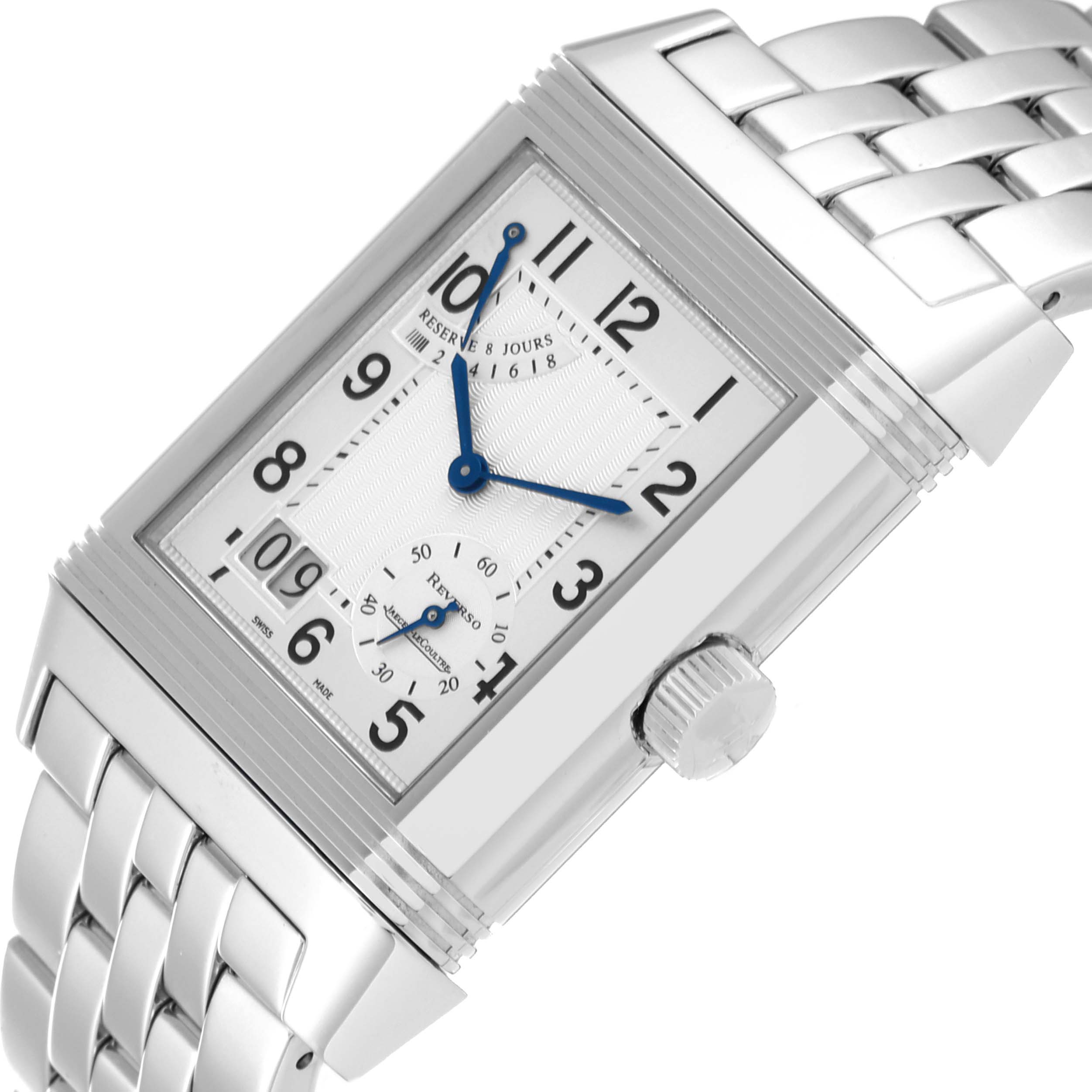 The image shows a Jaeger-LeCoultre Reverso watch at an angled close-up, highlighting the dial, crown, and part of the bracelet.