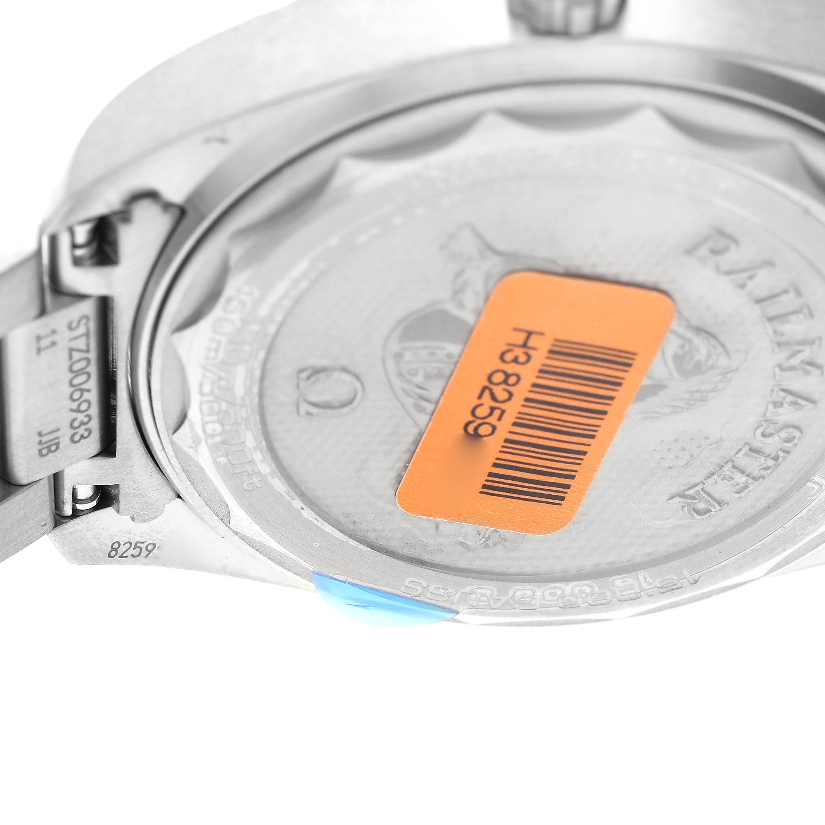 The image shows the back case of an Omega Seamaster 220.10.40.20.06.001 Men
s Stainless Steel Grey Dial 220.10.40.20.06.001 Men
s Stainless Steel Grey Dial watch with a visible barcode sticker and part of the bracelet.