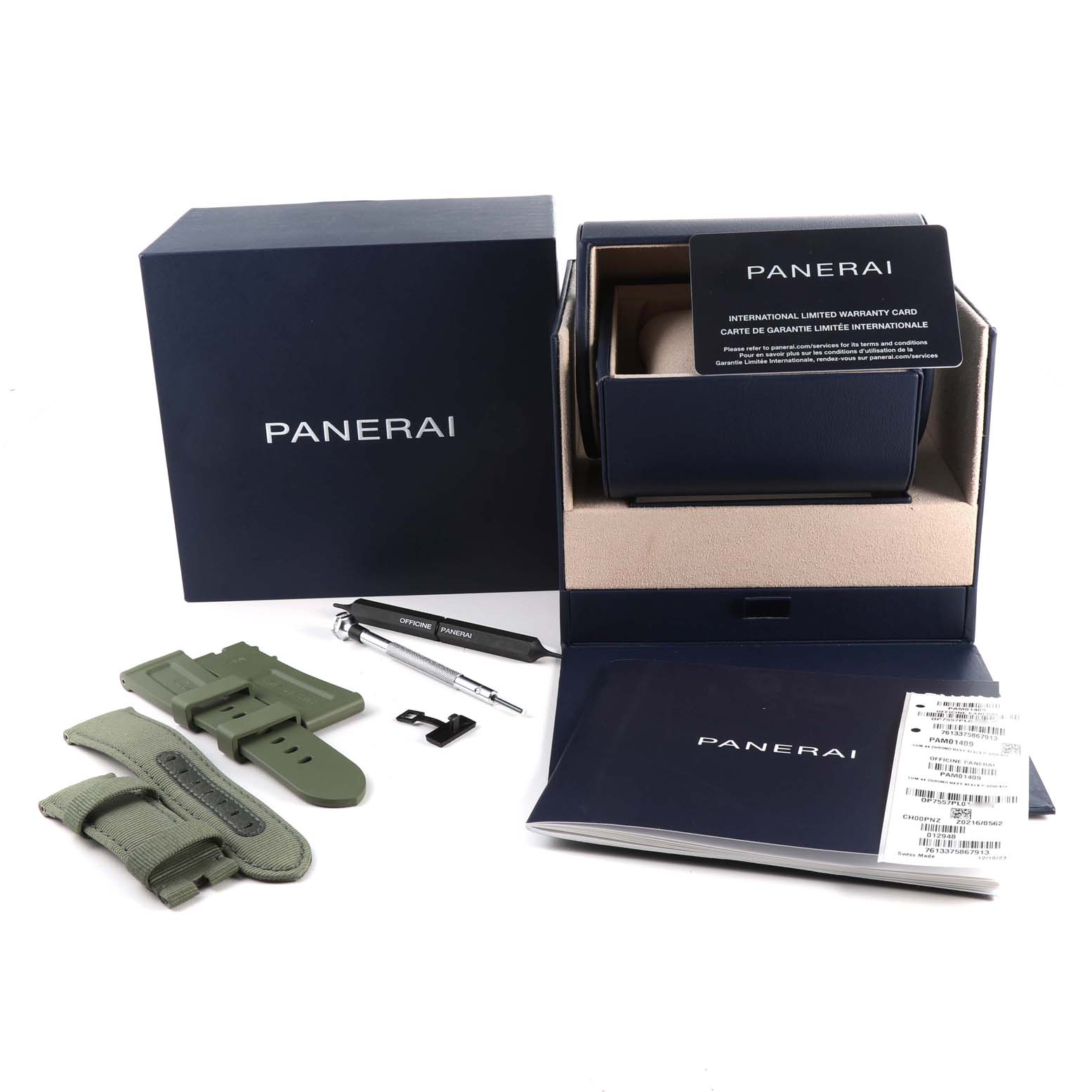 The image shows the packaging and accessories for a Panerai Luminor PAM01409 Men's Stainless Steel Grey Dial PAM01409 Men's Stainless Steel Grey Dial watch, including a box, strap, tools, and documentation.