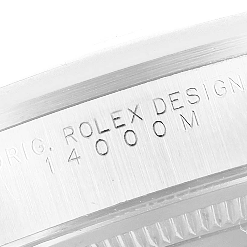 This close-up image shows the engraved model number and Rolex branding on the side of a Rolex Air-King 14000 Men's Stainless Steel Silver Dial 14000 Men's Stainless Steel Silver Dial watch case.