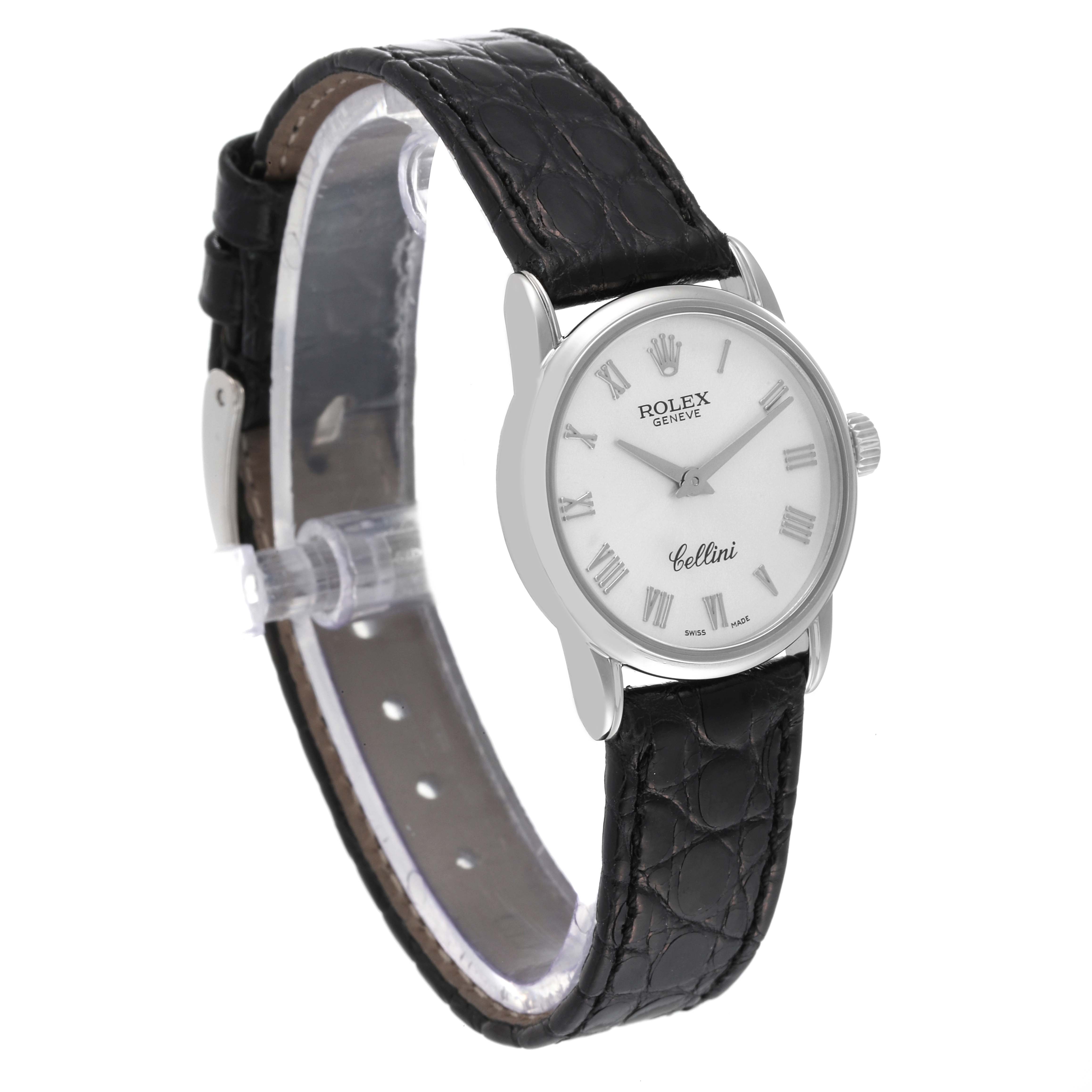 The Rolex Cellini 6111/1 Women's White Gold Silver Dial 6111/1 Women's White Gold Silver Dial watch is shown at a slight angle, displaying its face, casing, crown, and black leather strap.